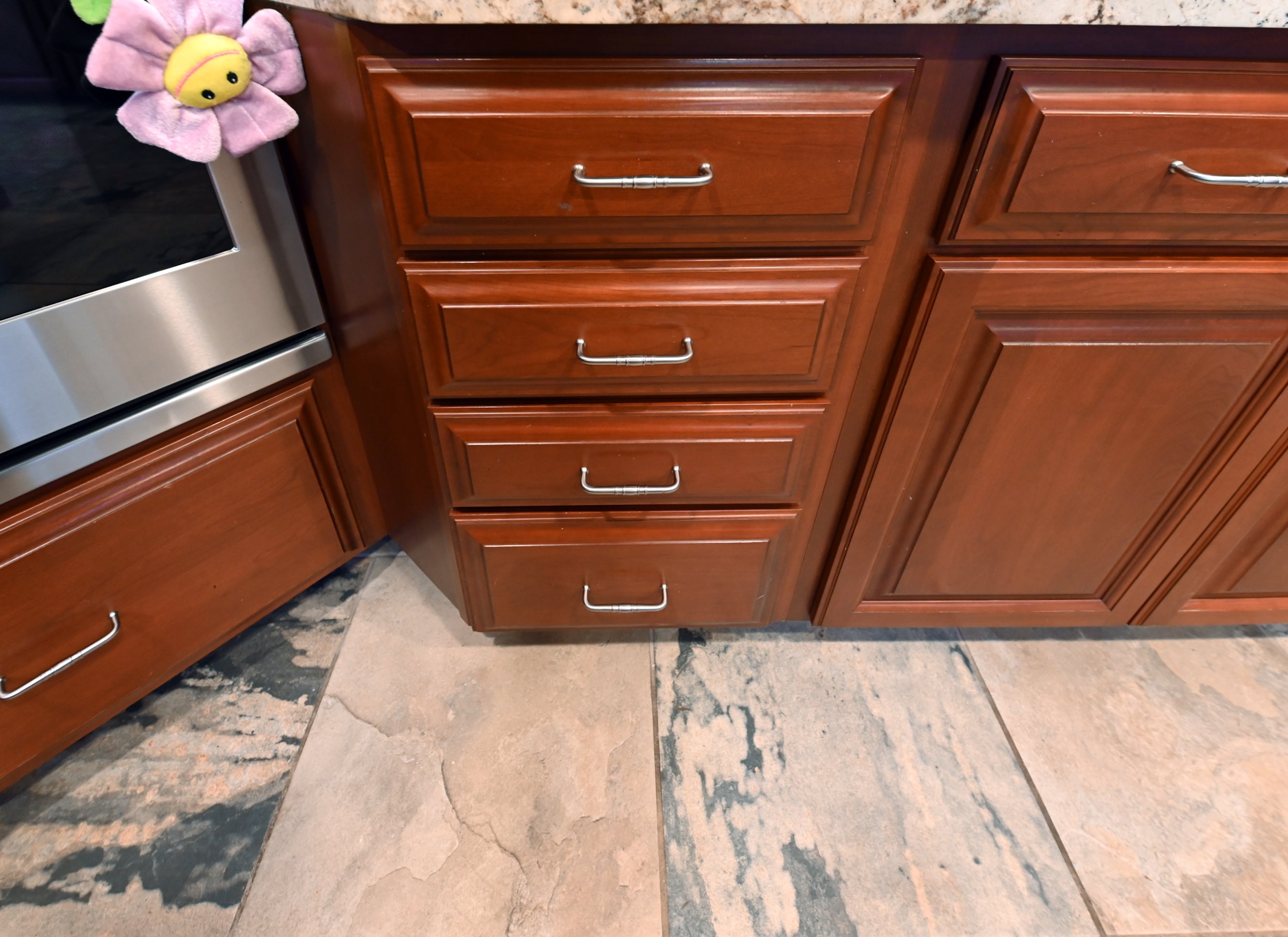 Ackley Cabinet Timeless Cherry & Stainless Traditional Pre-Owned Kitchen