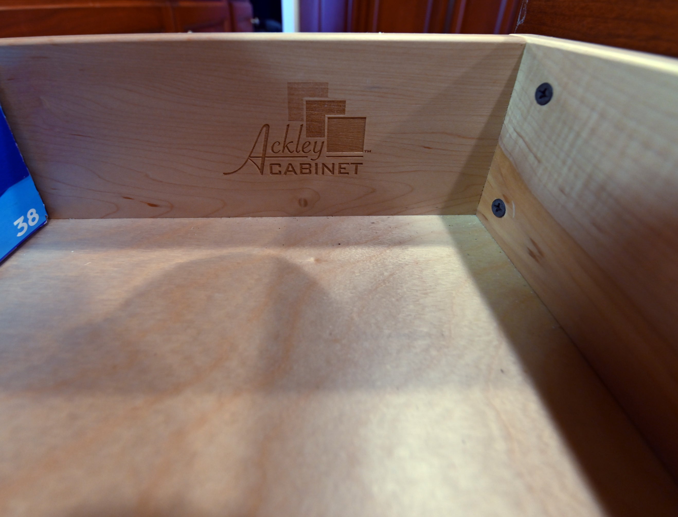 Ackley Cabinet Timeless Cherry & Stainless Traditional Pre-Owned Kitchen