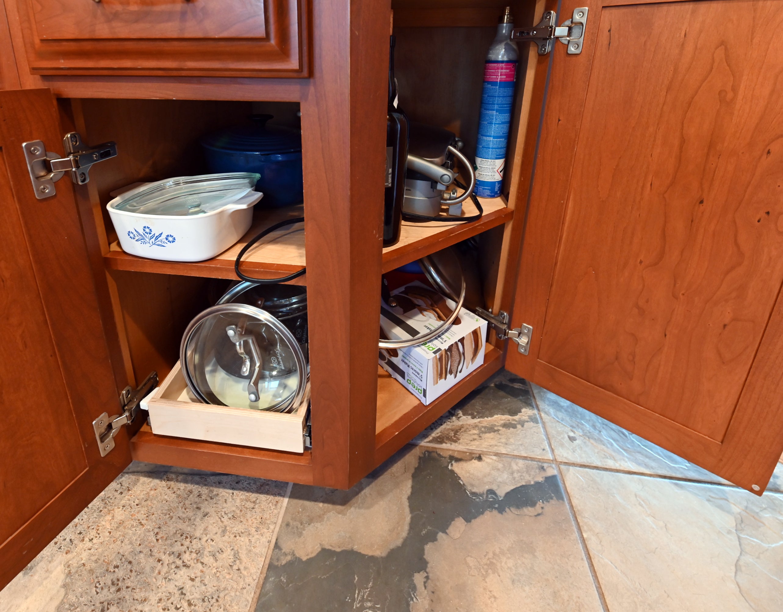 Ackley Cabinet Timeless Cherry & Stainless Traditional Pre-Owned Kitchen