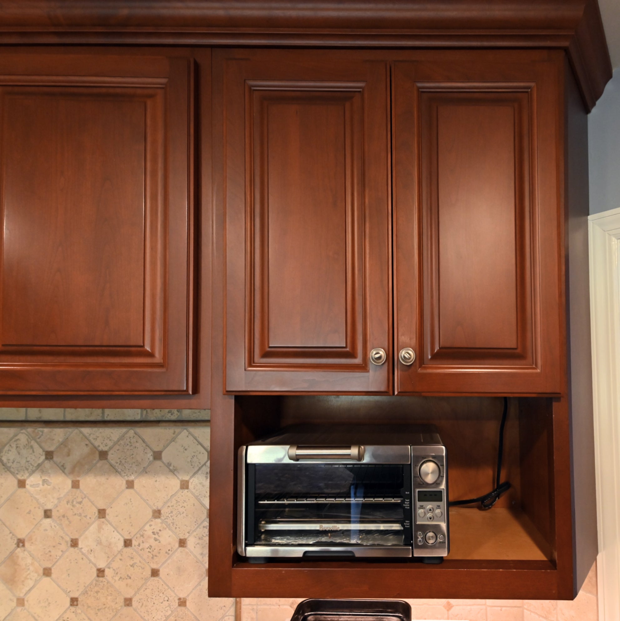 Ackley Cabinet Timeless Cherry & Stainless Traditional Pre-Owned Kitchen