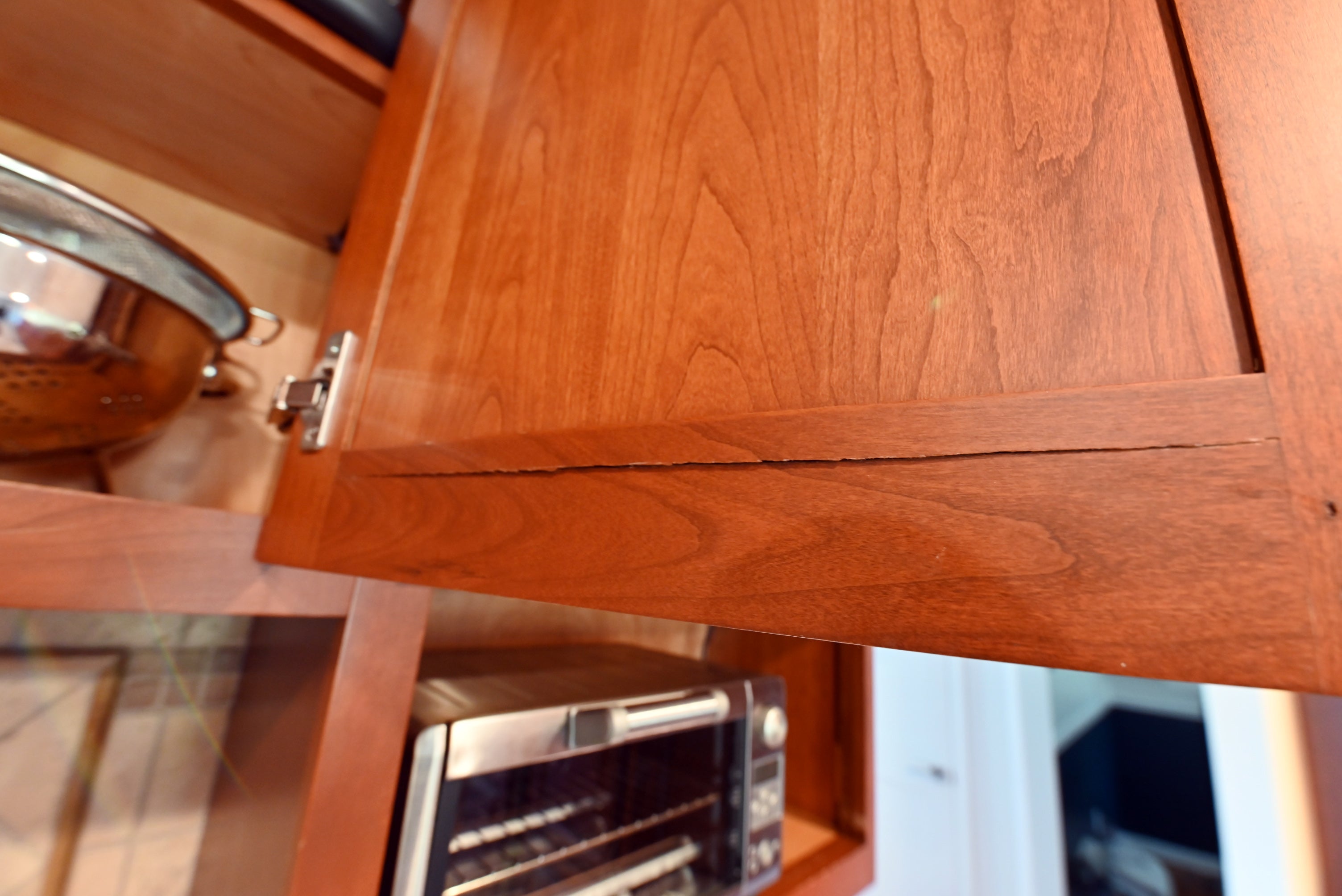 Ackley Cabinet Timeless Cherry & Stainless Traditional Pre-Owned Kitchen