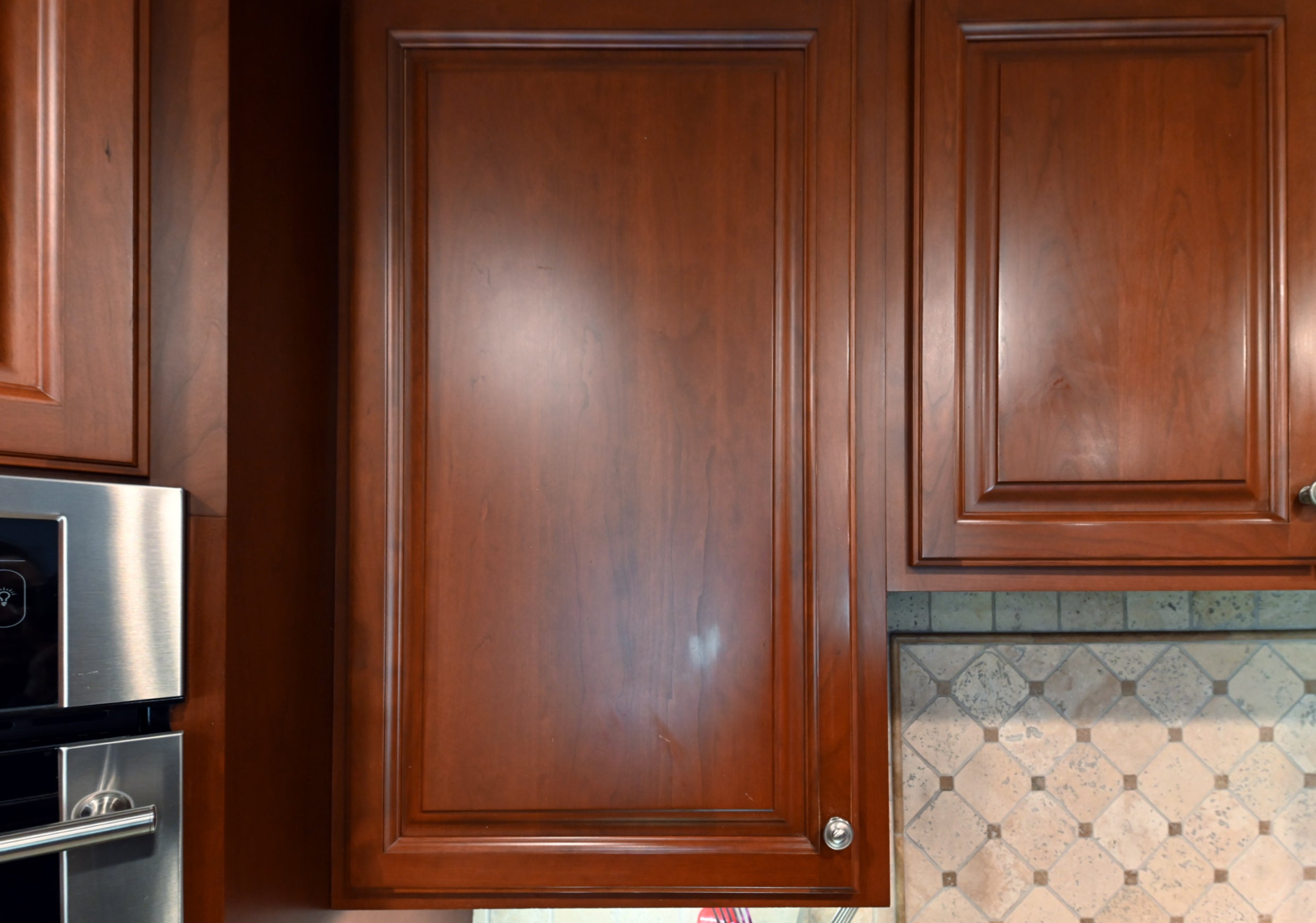 Ackley Cabinet Timeless Cherry & Stainless Traditional Pre-Owned Kitchen