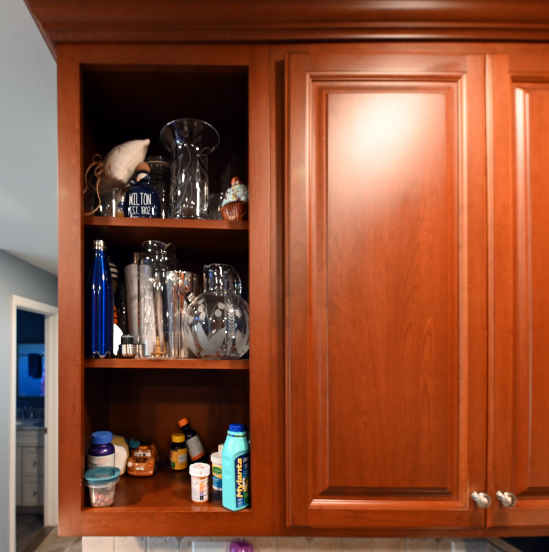 Ackley Cabinet Timeless Cherry & Stainless Traditional Pre-Owned Kitchen