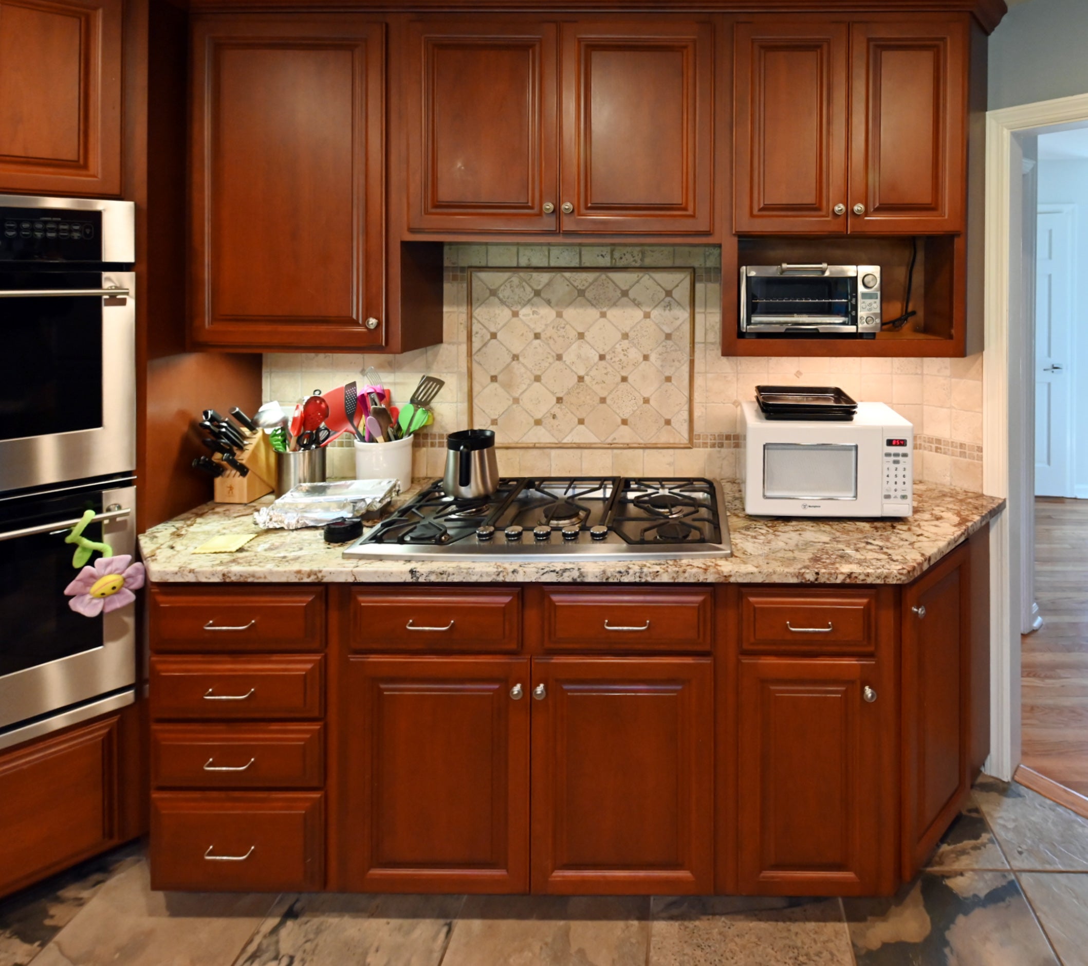 Ackley Cabinet Timeless Cherry & Stainless Traditional Pre-Owned Kitchen