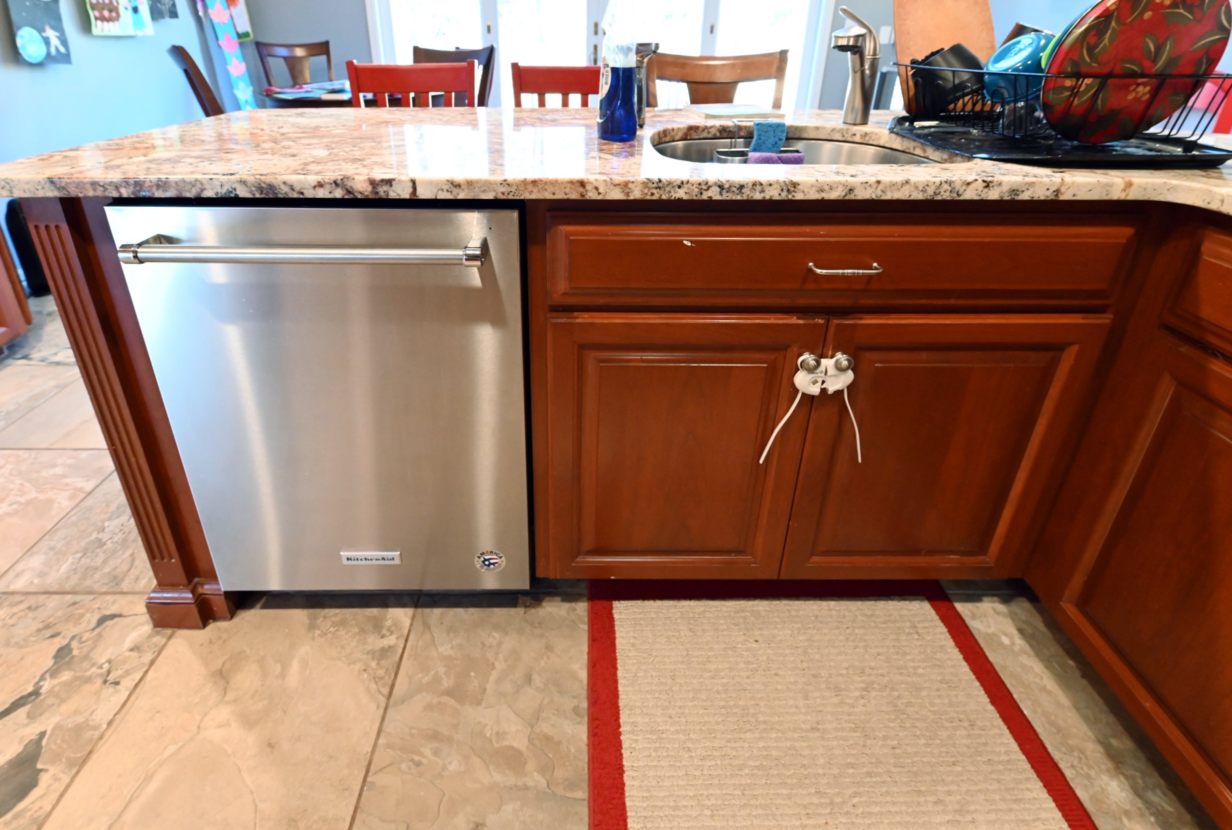 Ackley Cabinet Timeless Cherry & Stainless Traditional Pre-Owned Kitchen