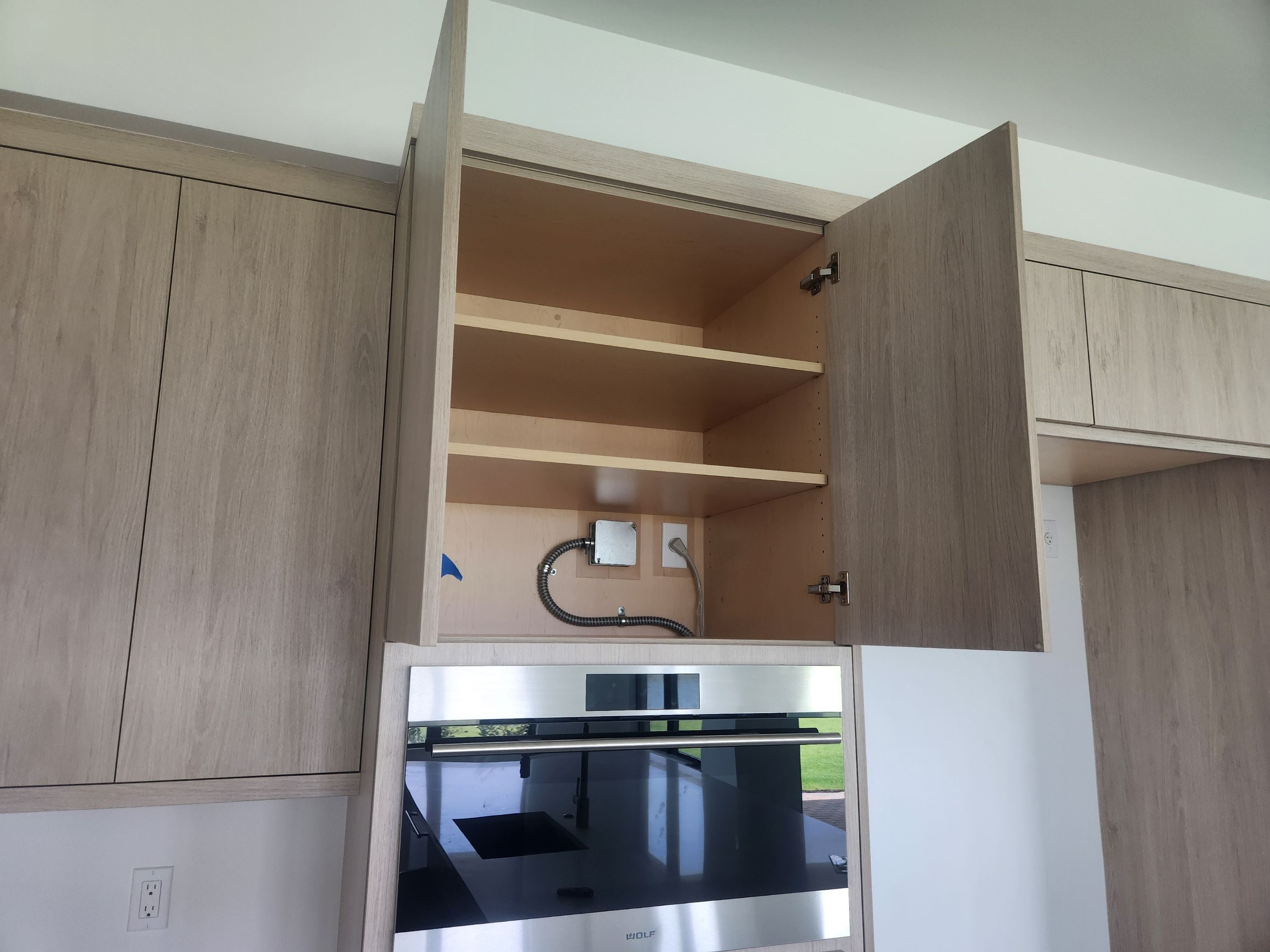 Cabico Sandy Oak Transitional Kitchen with Island & Wolf Appliances