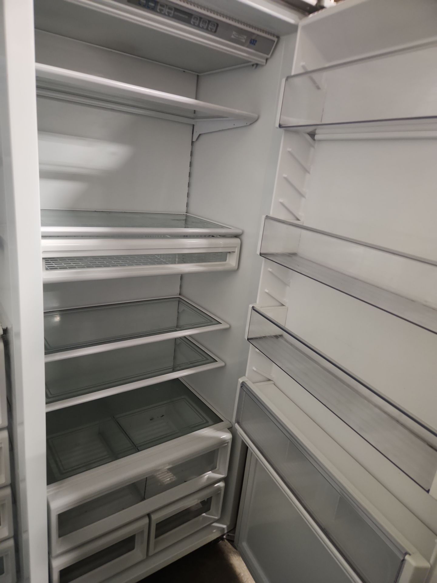 ÒThe WesterlyÓ Transitional White Kitchen with Island, 48" Sub-Zero Refrigerator and Bosch Appliances