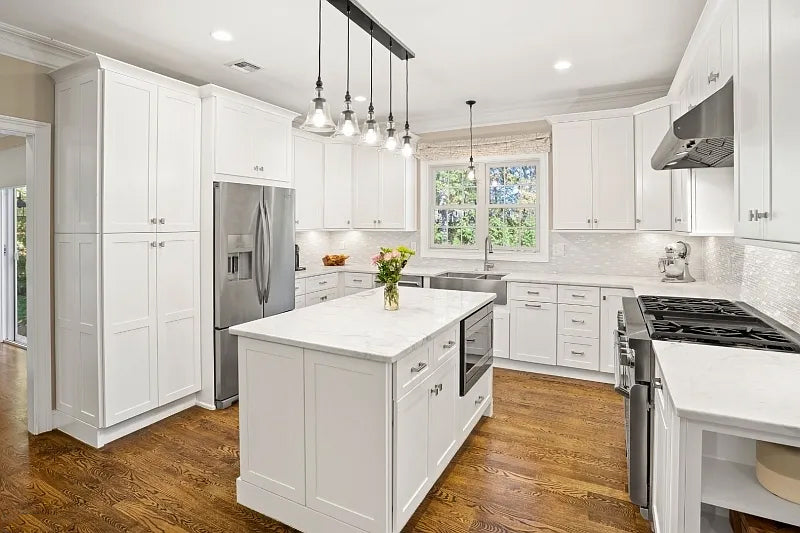 Fabuwood Transitional White Kitchen with Island and White Marble Countertops