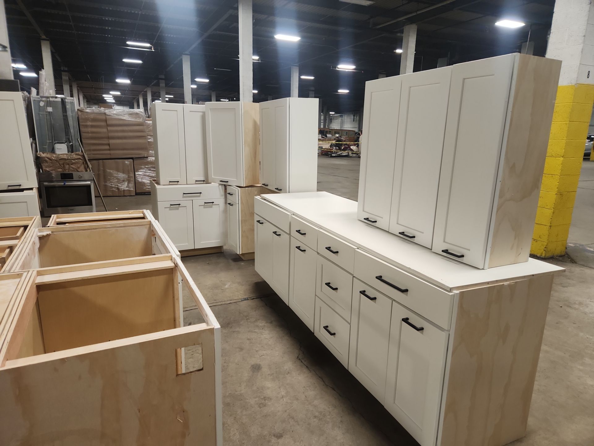 ÒThe WesterlyÓ Transitional White Kitchen with Island, 48" Sub-Zero Refrigerator and Bosch Appliances