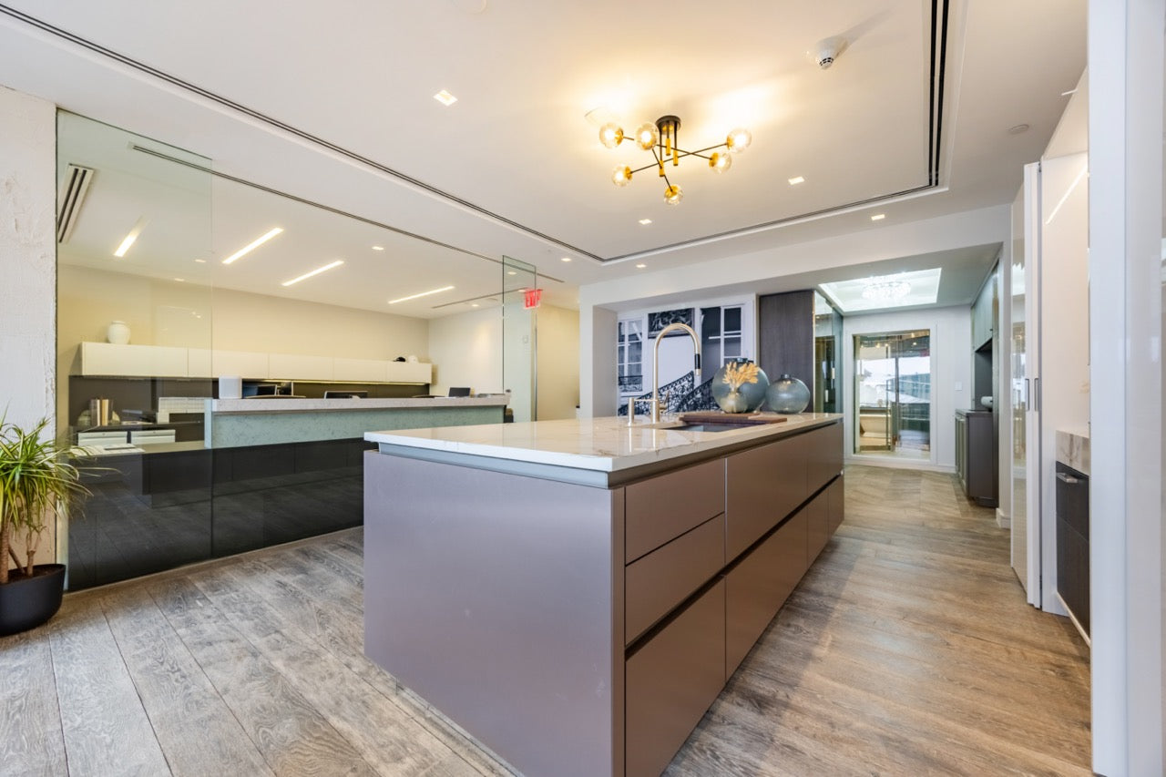 SieMatic S2 Modern Rose Gold Handleless Island with Lotus White Hideaway Pantry