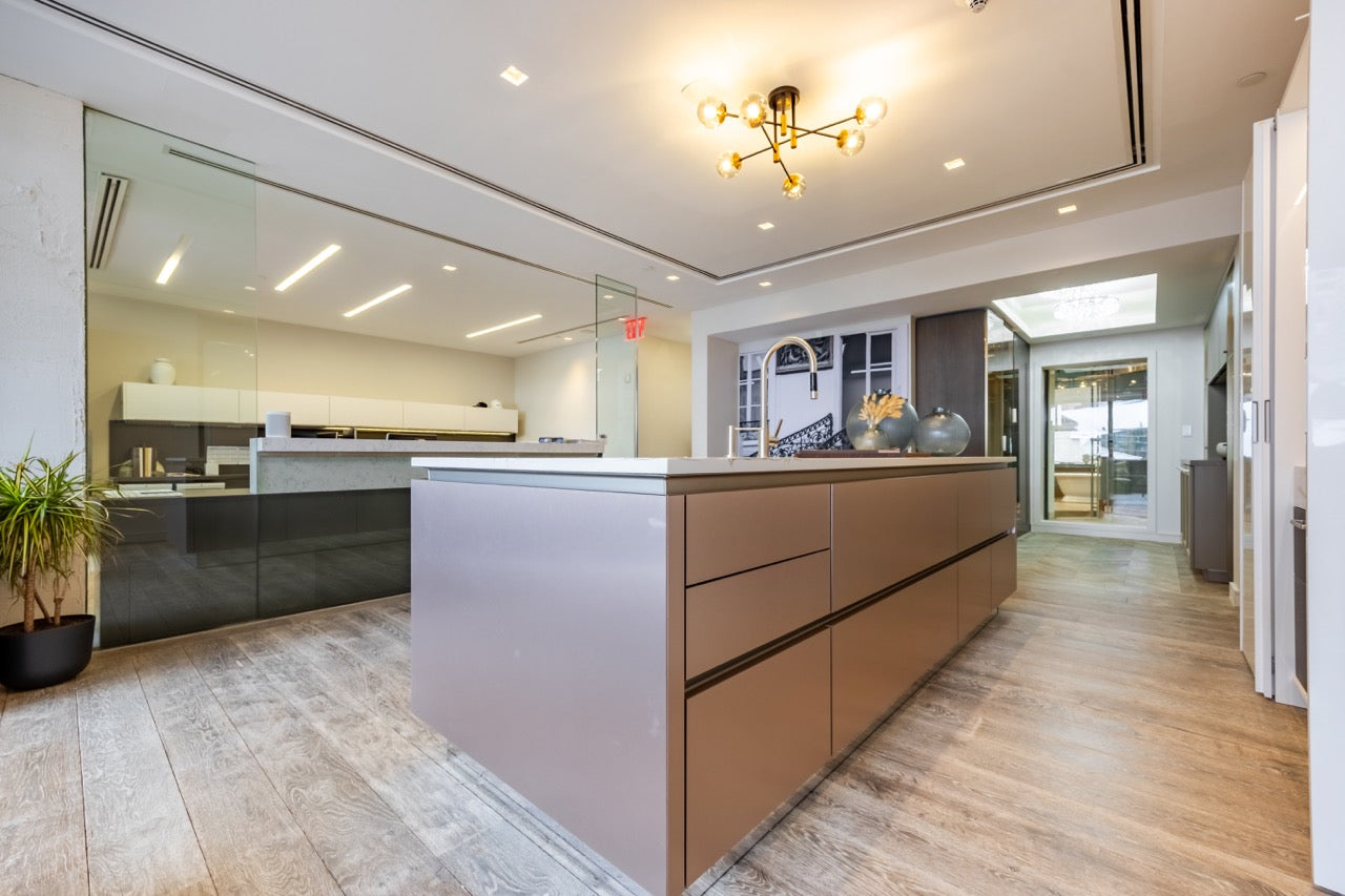 SieMatic S2 Modern Rose Gold Handleless Island with Lotus White Hideaway Pantry