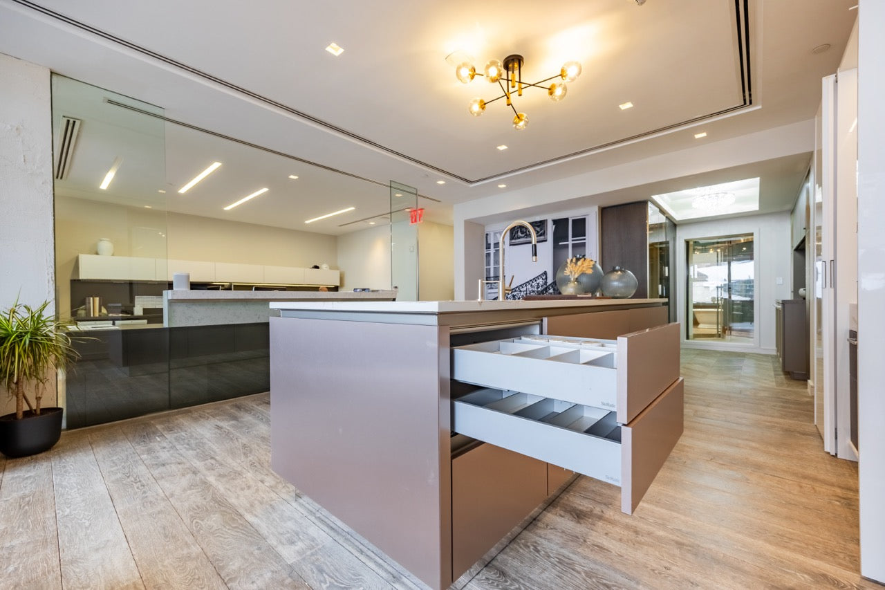 SieMatic S2 Modern Rose Gold Handleless Island with Lotus White Hideaway Pantry