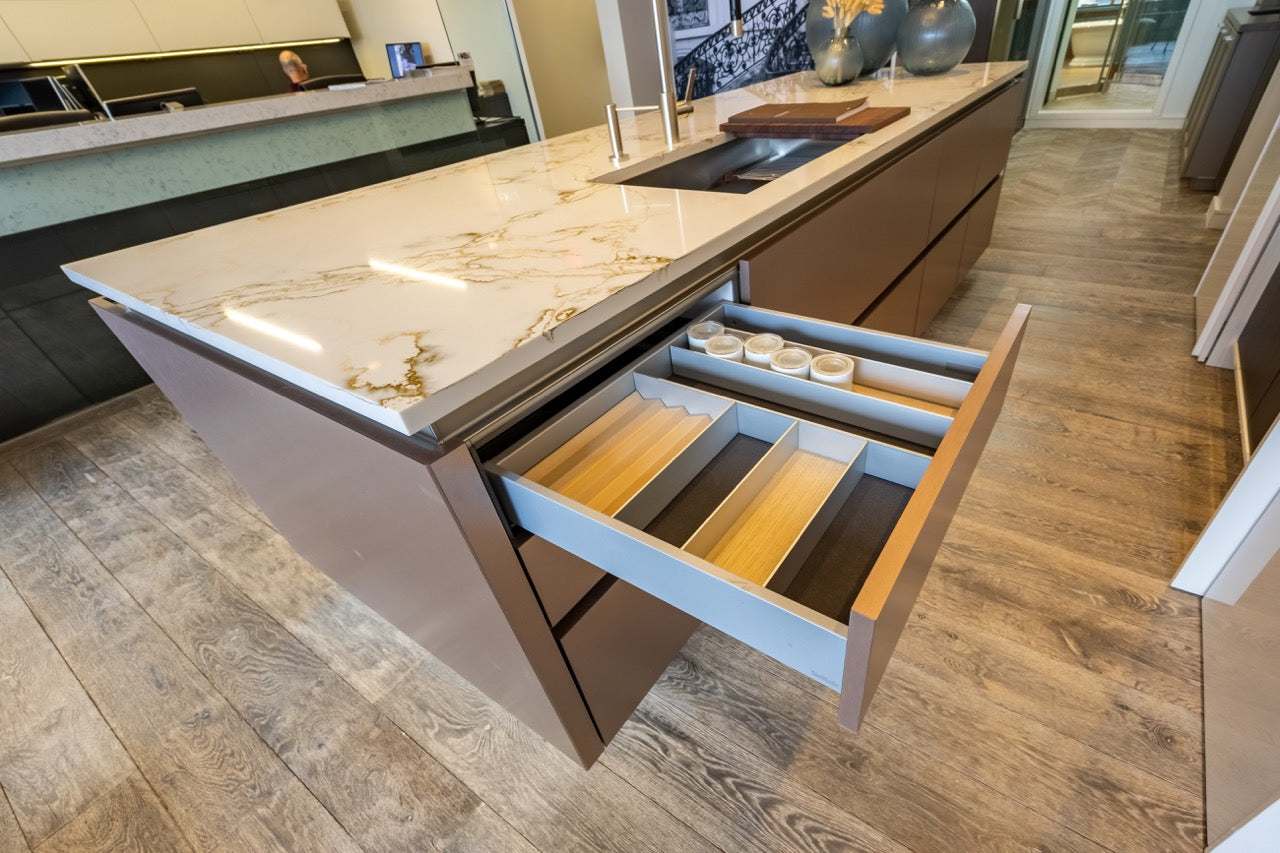 SieMatic S2 Modern Rose Gold Handleless Island with Lotus White Hideaway Pantry