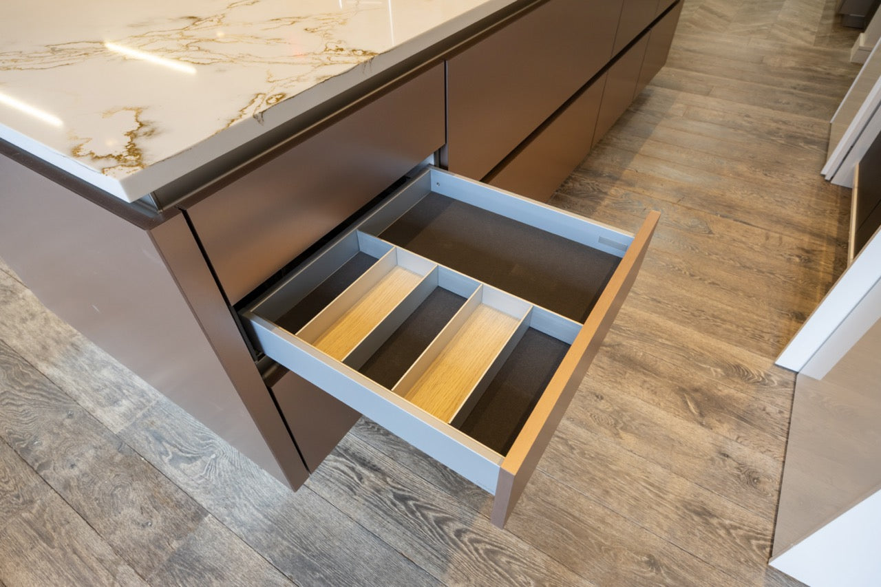 SieMatic S2 Modern Rose Gold Handleless Island with Lotus White Hideaway Pantry