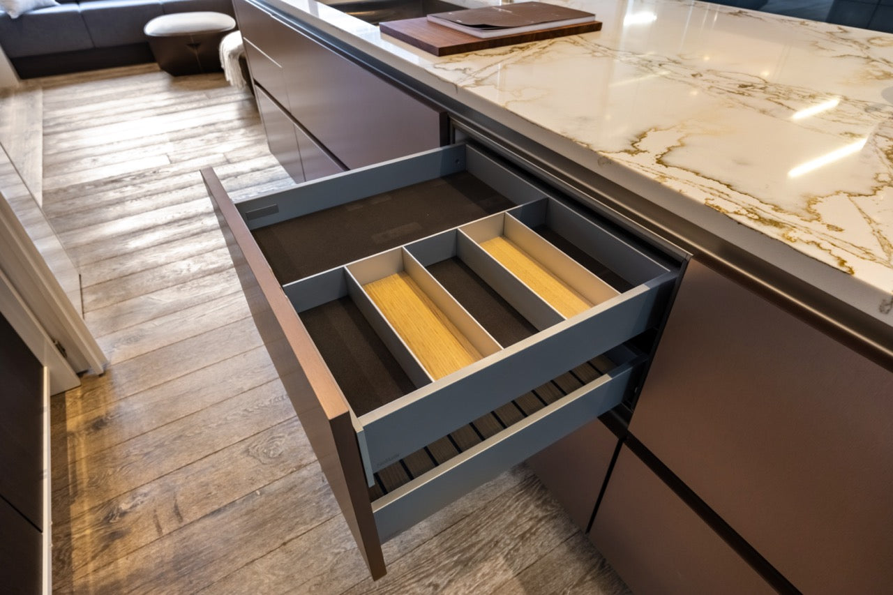 SieMatic S2 Modern Rose Gold Handleless Island with Lotus White Hideaway Pantry
