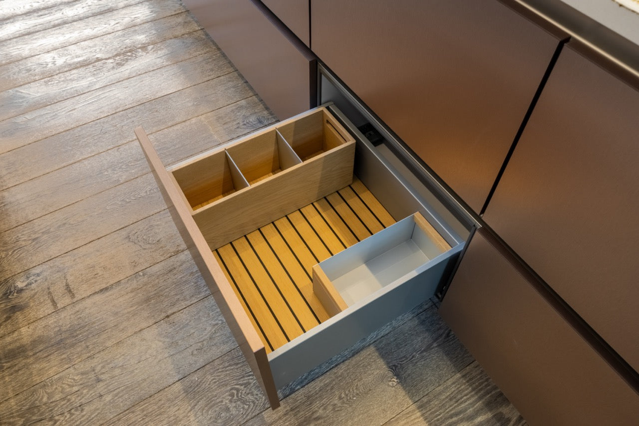 SieMatic S2 Modern Rose Gold Handleless Island with Lotus White Hideaway Pantry