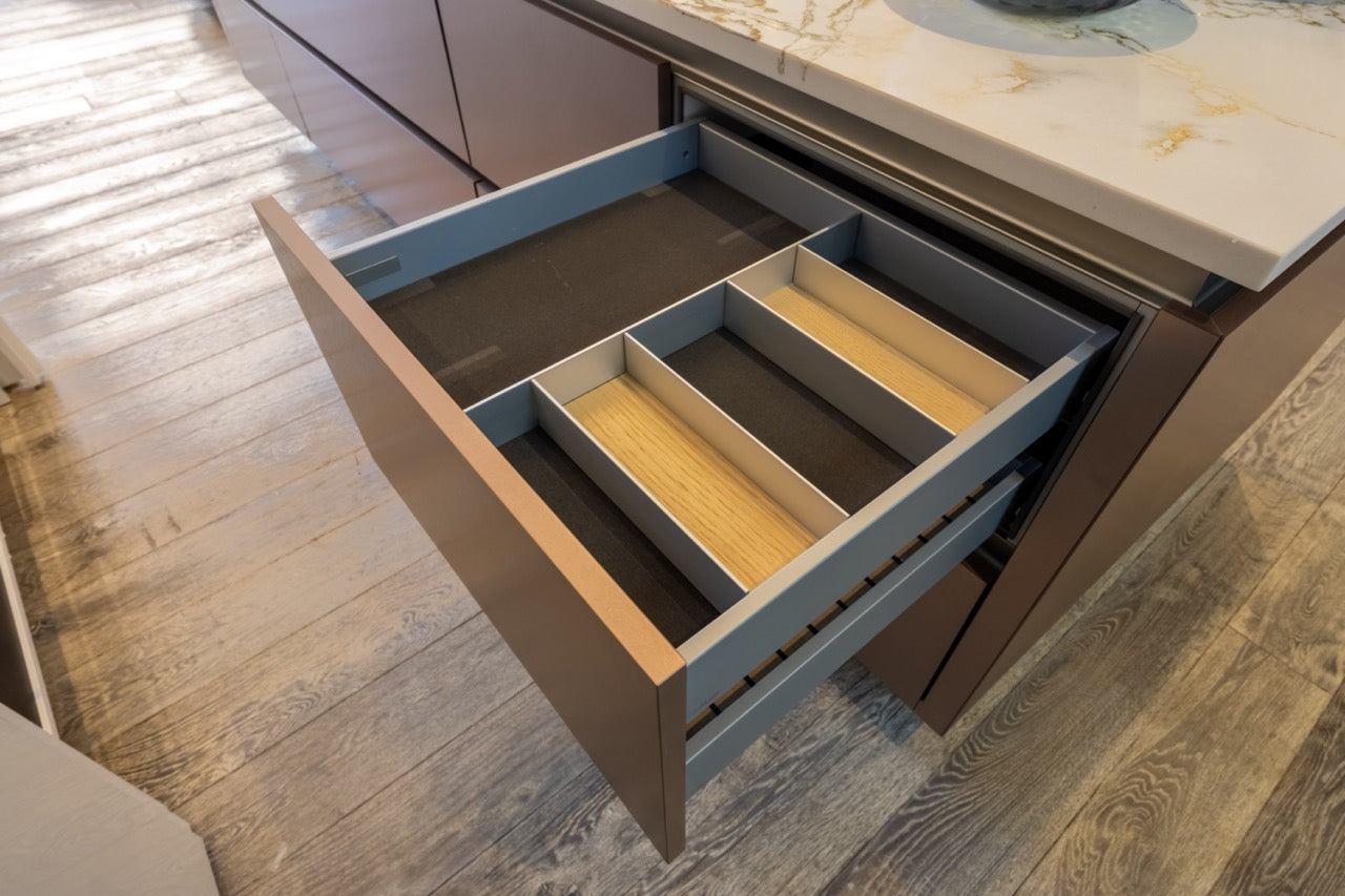 SieMatic S2 Modern Rose Gold Handleless Island with Lotus White Hideaway Pantry