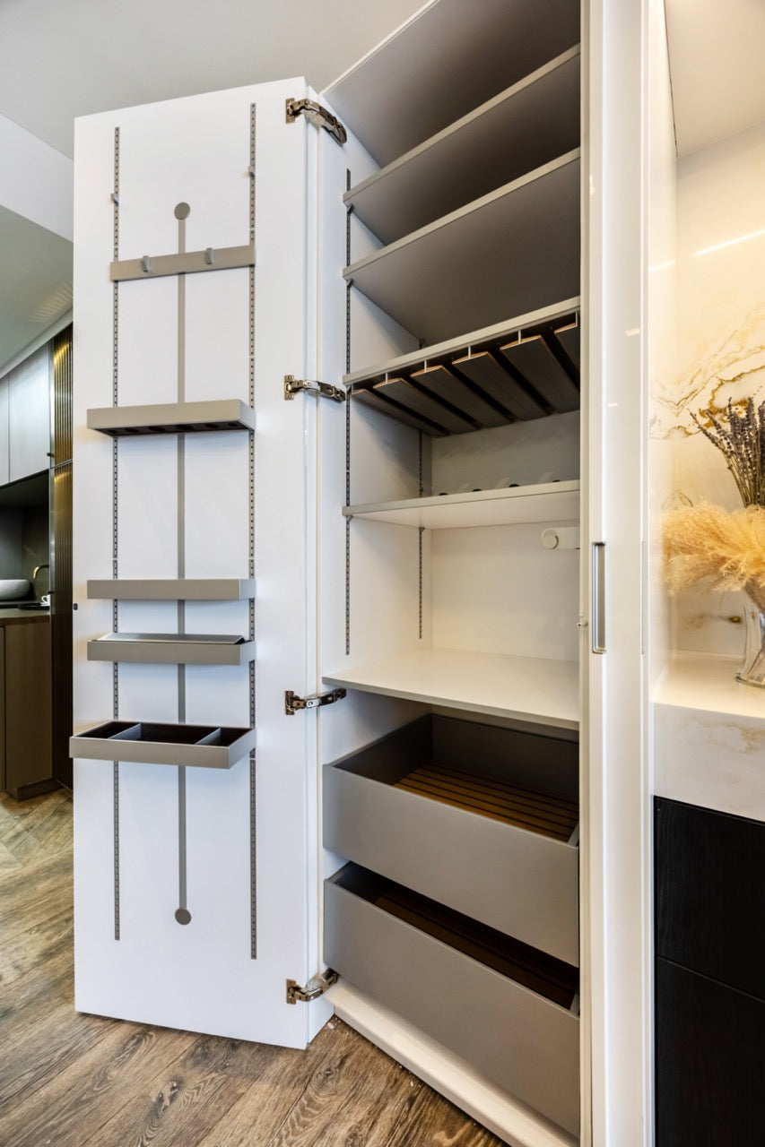 SieMatic S2 Modern Rose Gold Handleless Island with Lotus White Hideaway Pantry