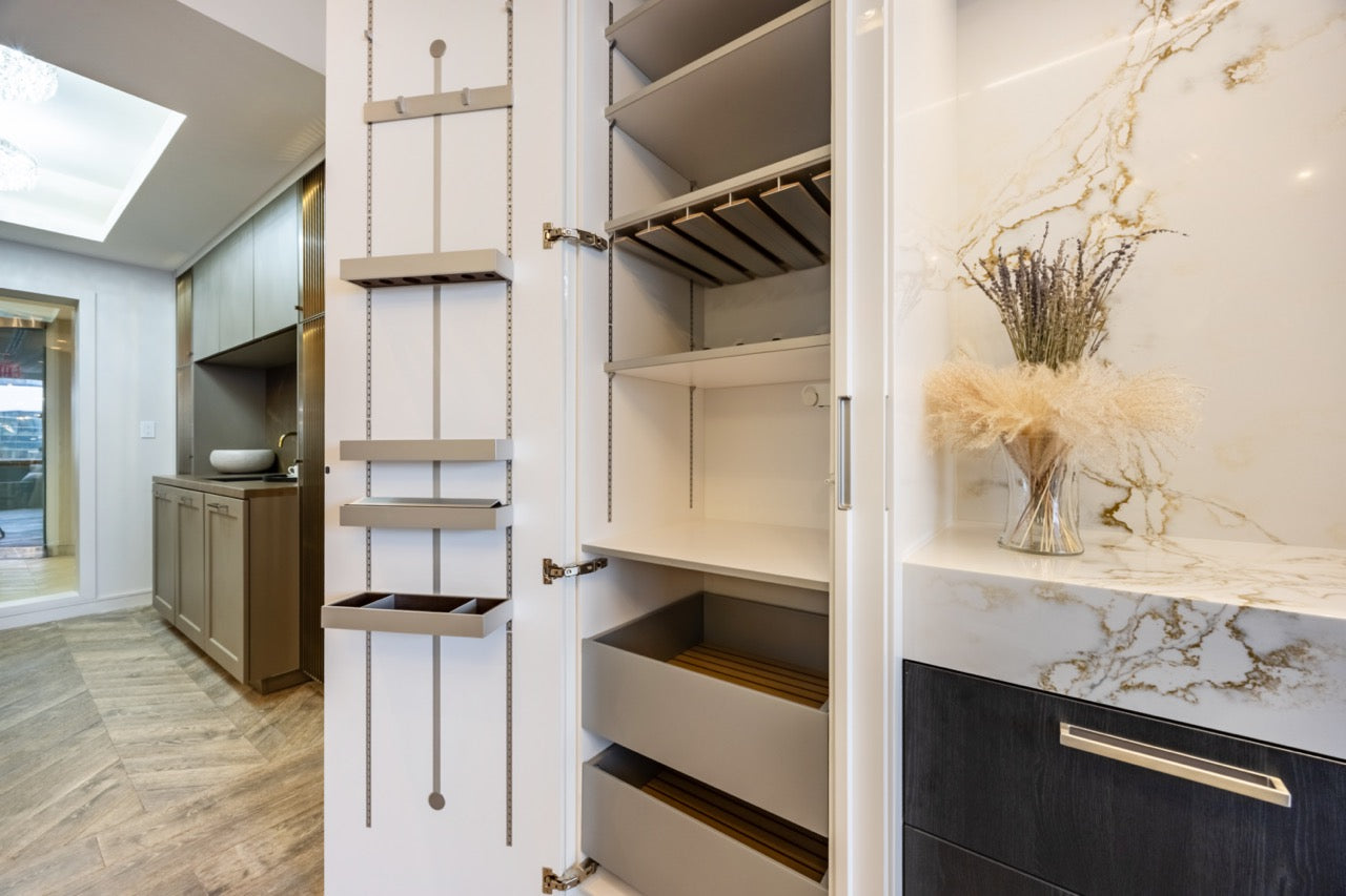 SieMatic S2 Modern Rose Gold Handleless Island with Lotus White Hideaway Pantry