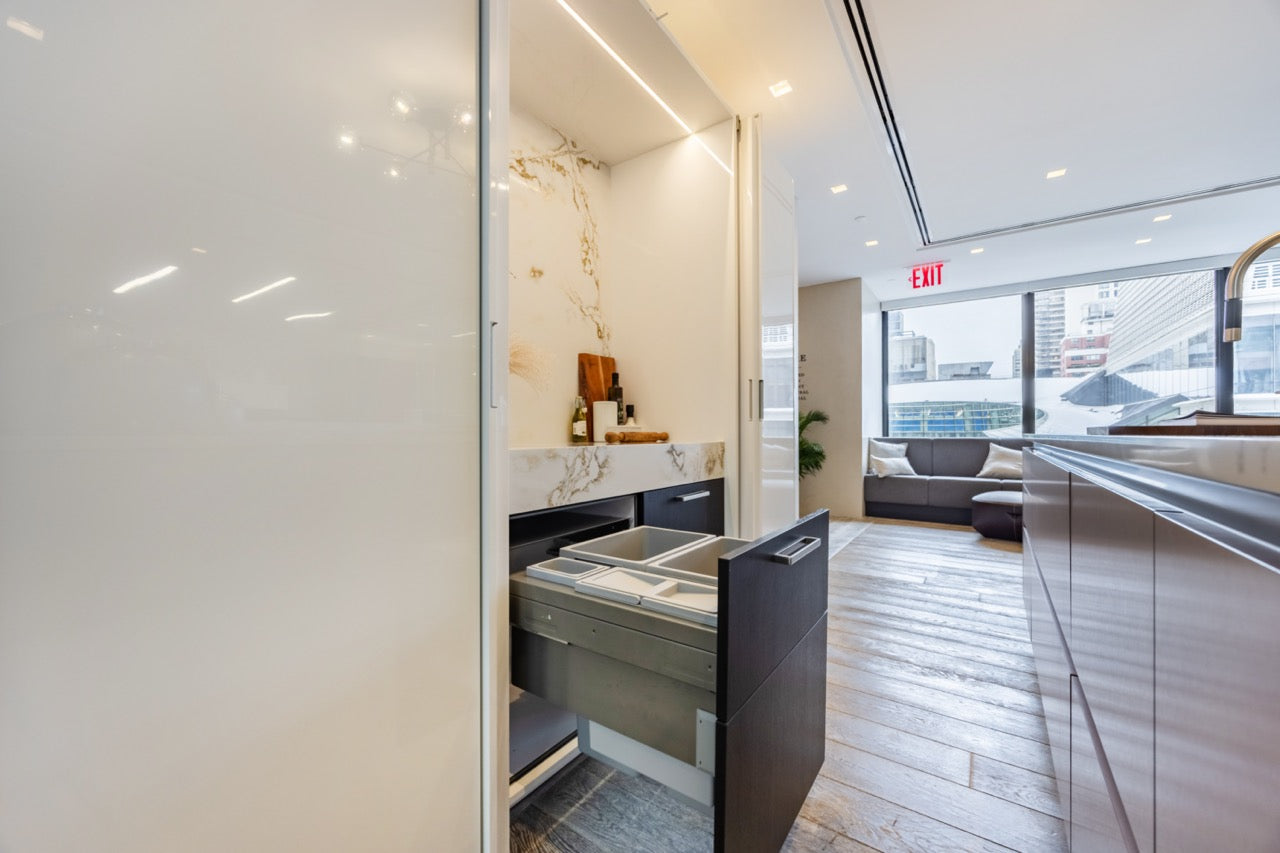 SieMatic S2 Modern Rose Gold Handleless Island with Lotus White Hideaway Pantry