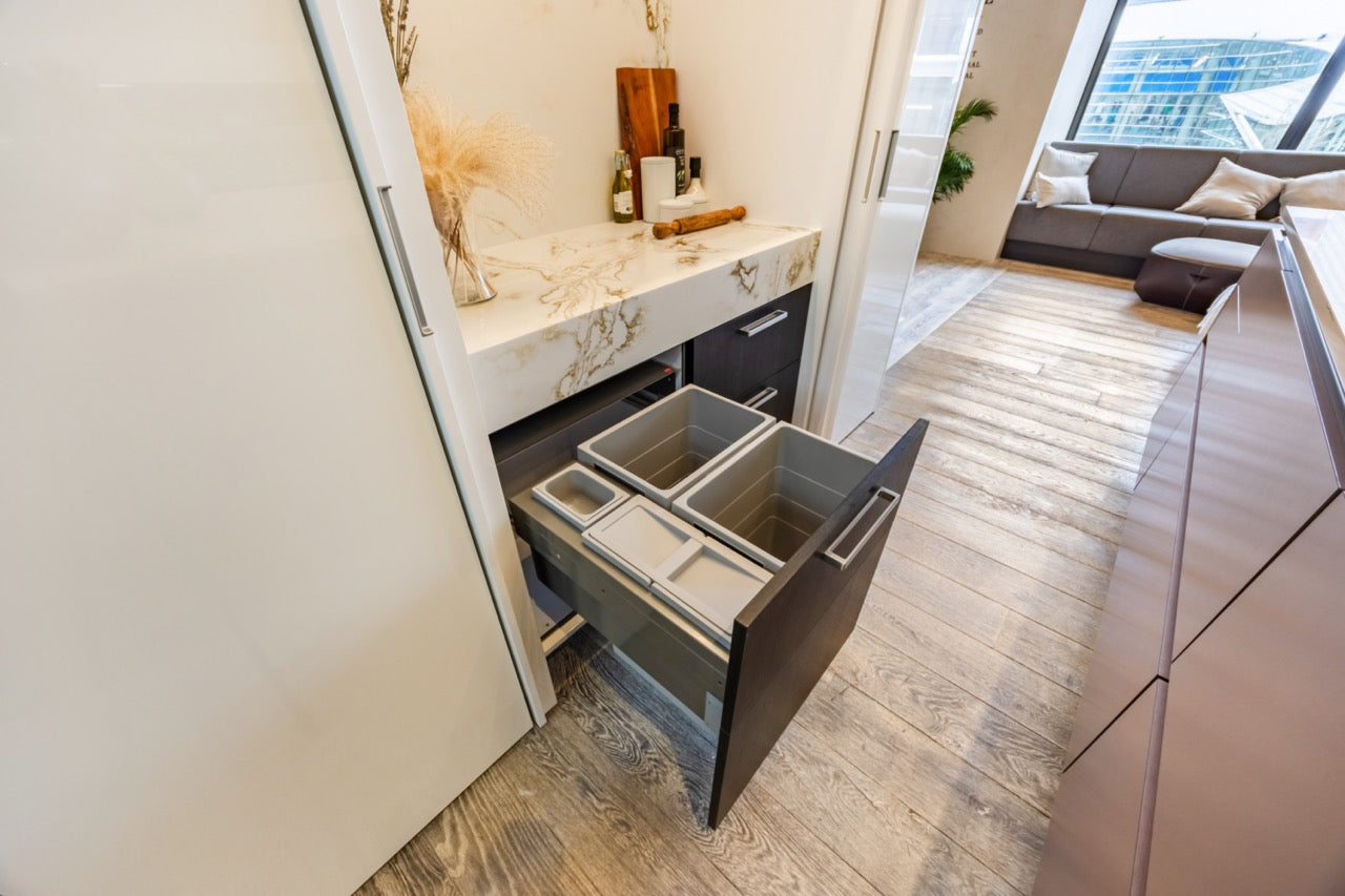SieMatic S2 Modern Rose Gold Handleless Island with Lotus White Hideaway Pantry