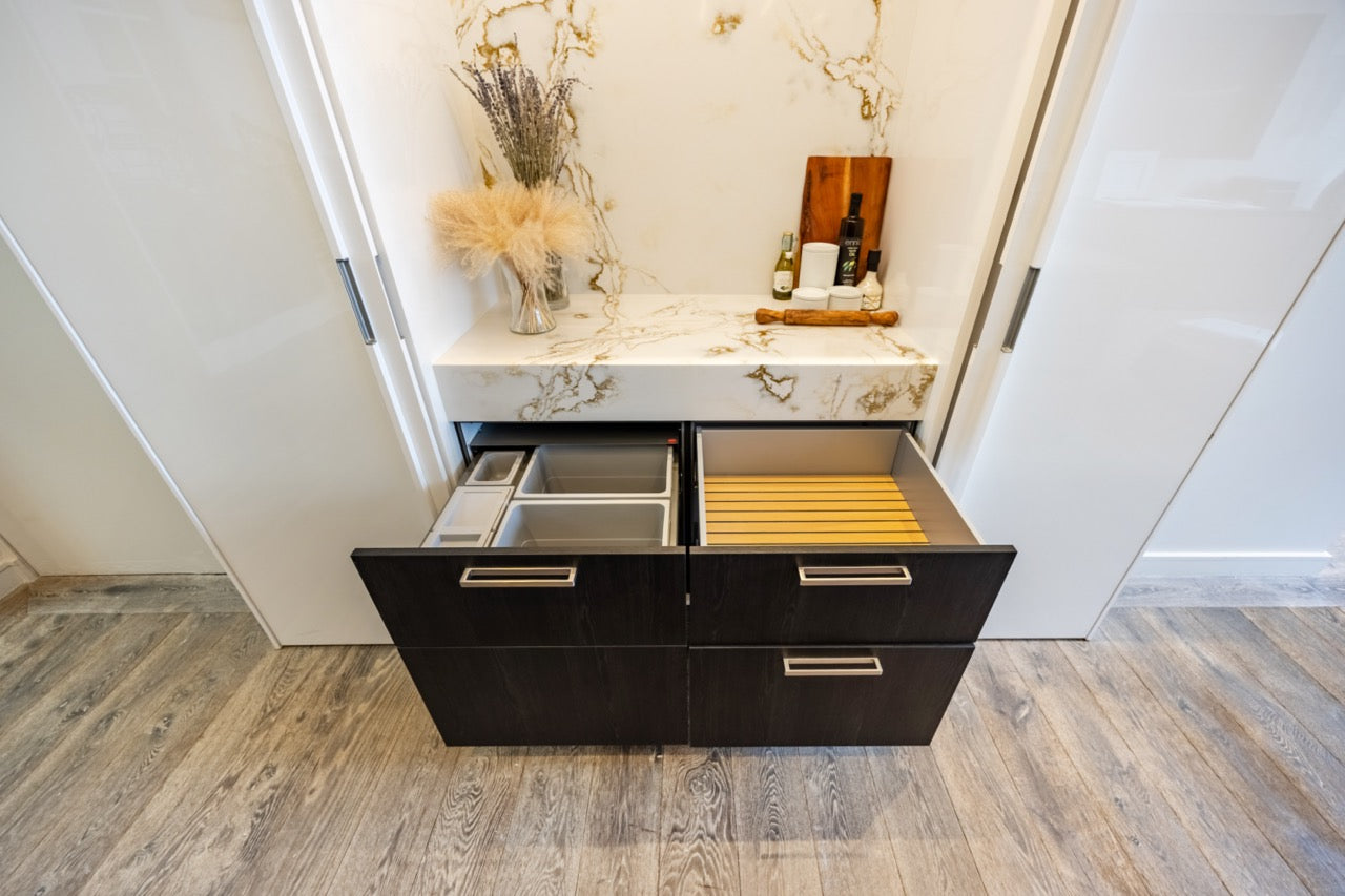 SieMatic S2 Modern Rose Gold Handleless Island with Lotus White Hideaway Pantry