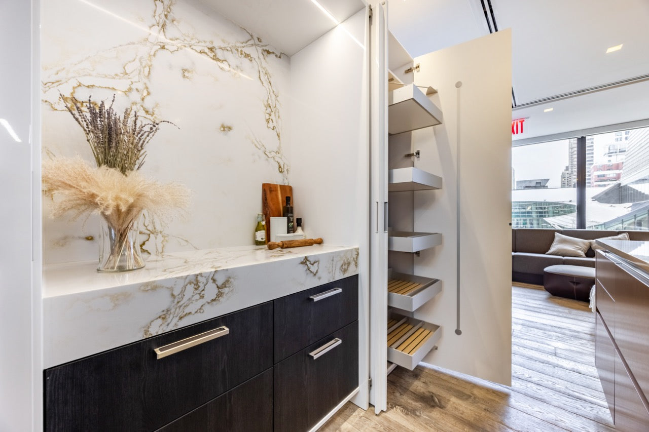 SieMatic S2 Modern Rose Gold Handleless Island with Lotus White Hideaway Pantry