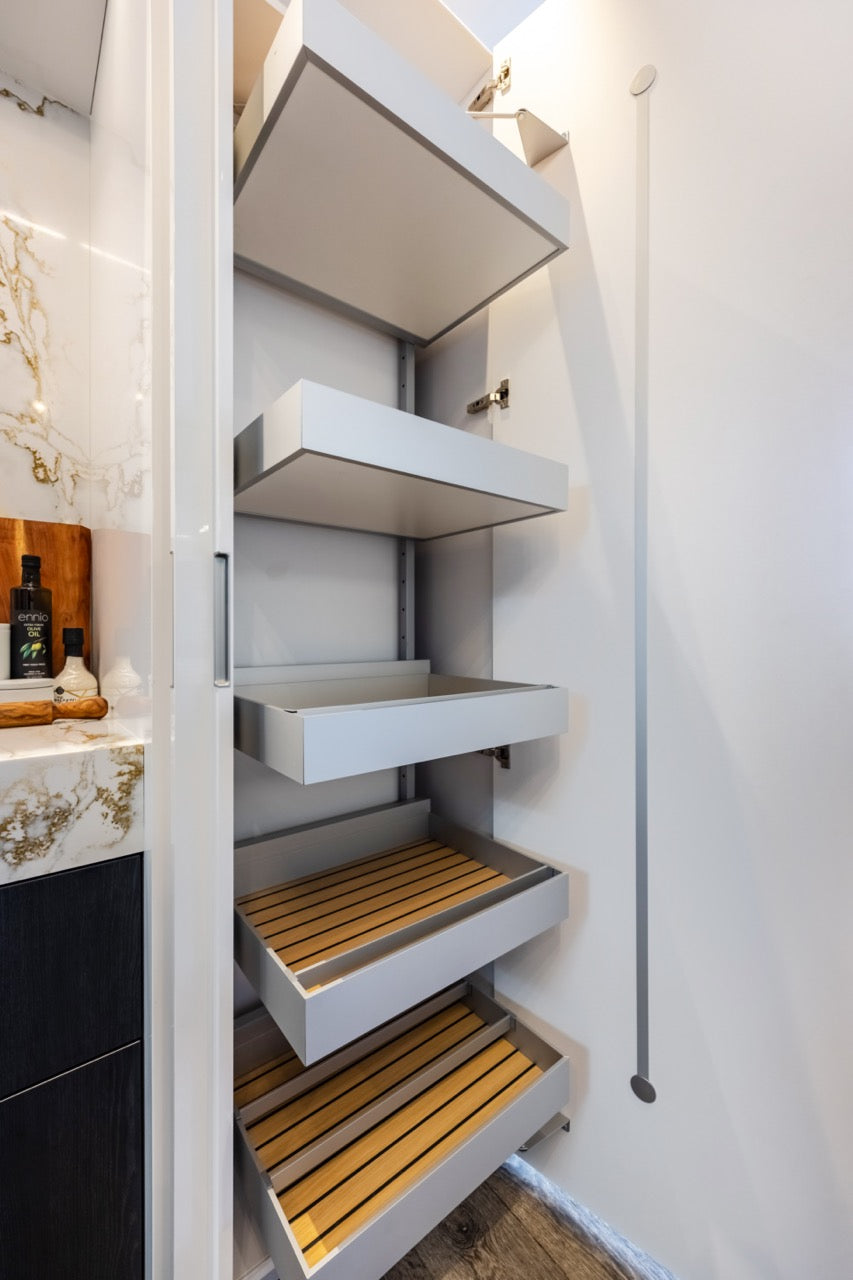 SieMatic S2 Modern Rose Gold Handleless Island with Lotus White Hideaway Pantry