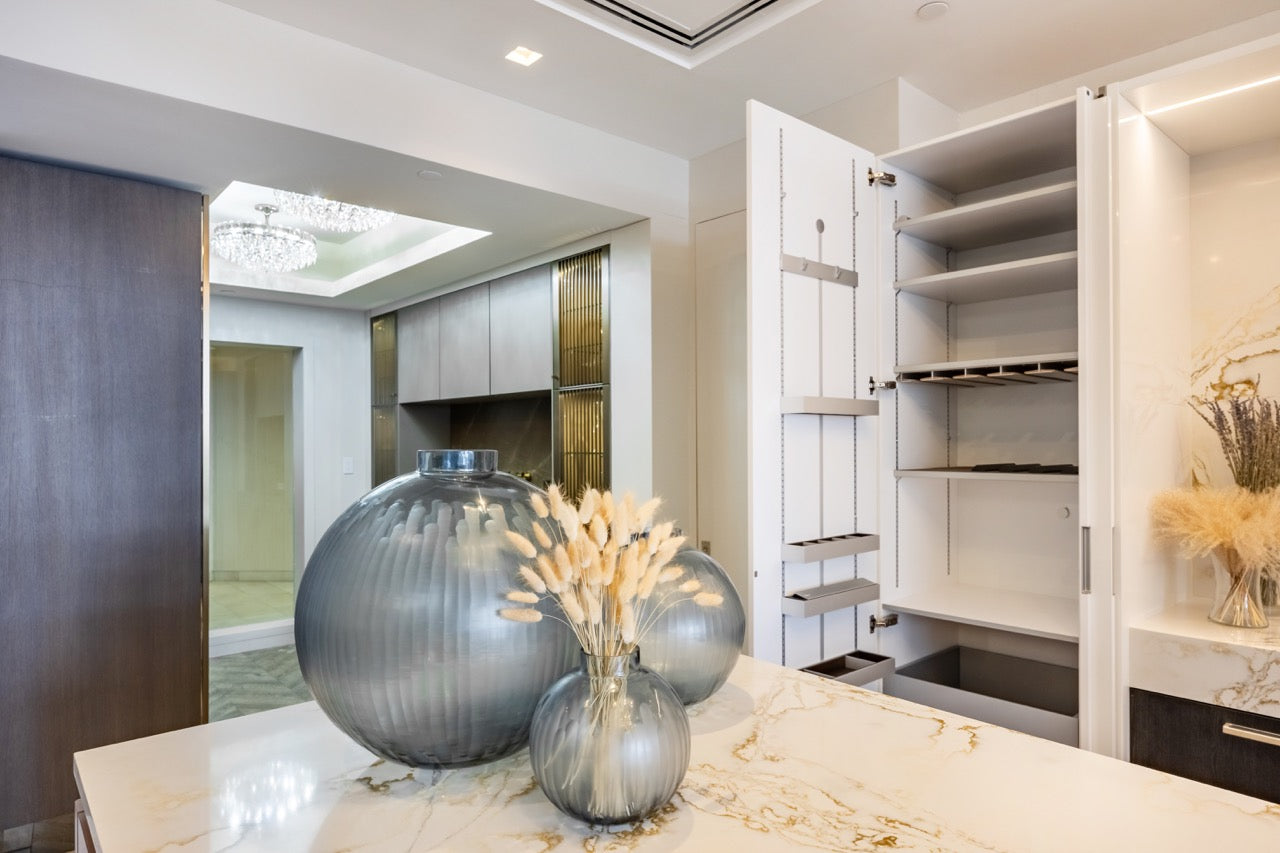 SieMatic S2 Modern Rose Gold Handleless Island with Lotus White Hideaway Pantry