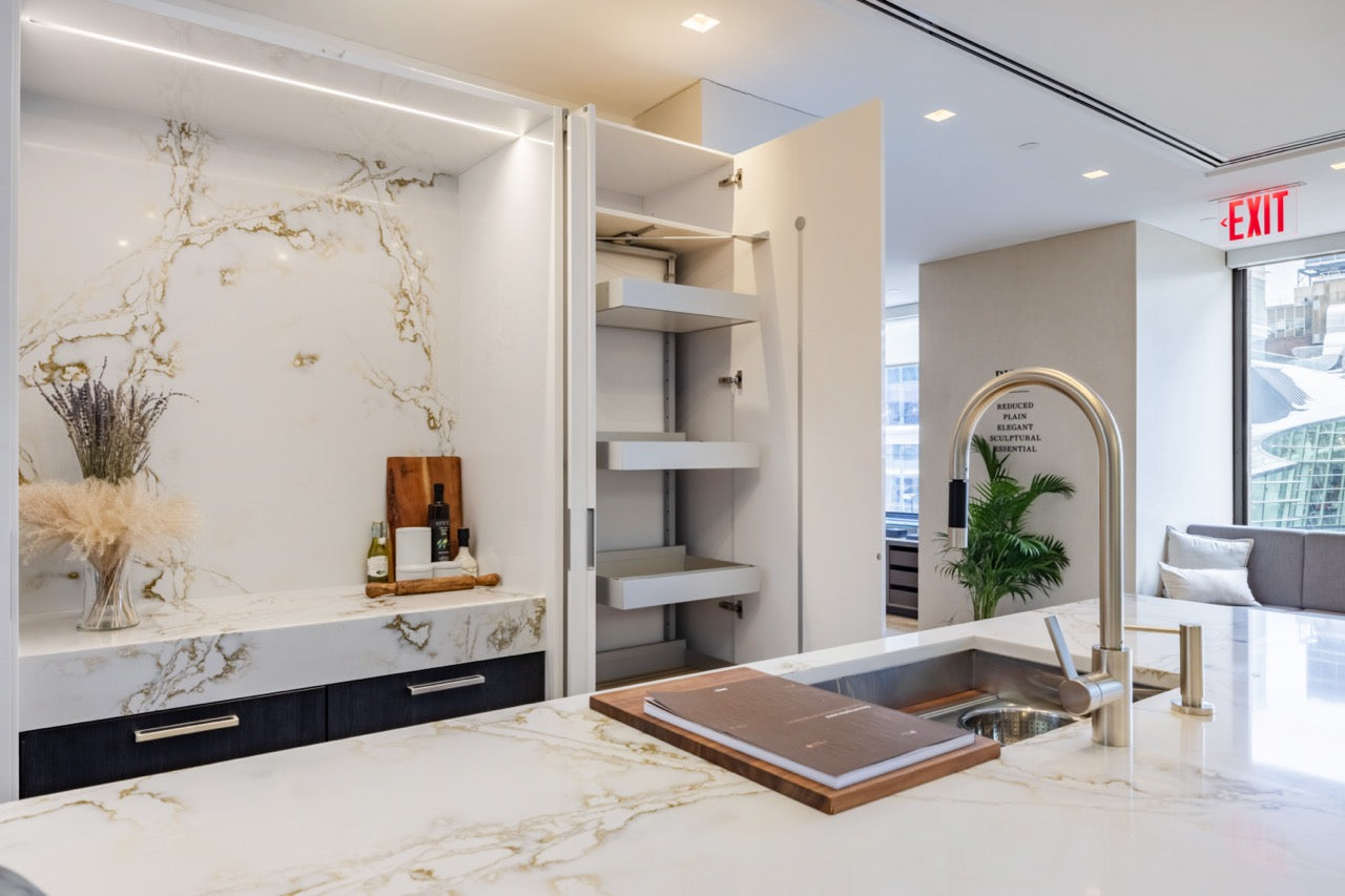 SieMatic S2 Modern Rose Gold Handleless Island with Lotus White Hideaway Pantry