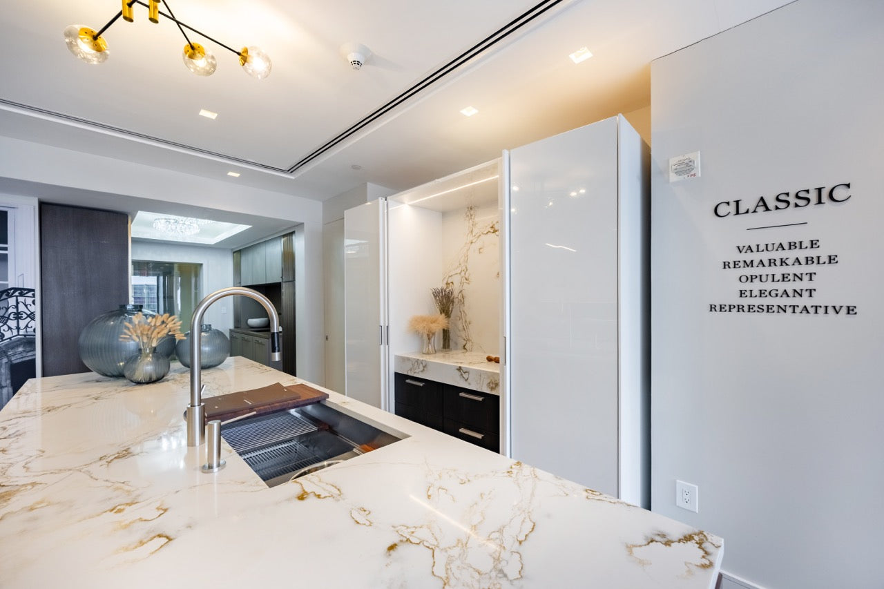 SieMatic S2 Modern Rose Gold Handleless Island with Lotus White Hideaway Pantry