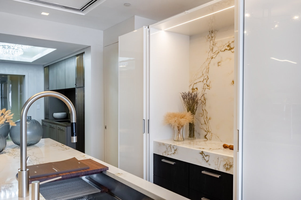 SieMatic S2 Modern Rose Gold Handleless Island with Lotus White Hideaway Pantry