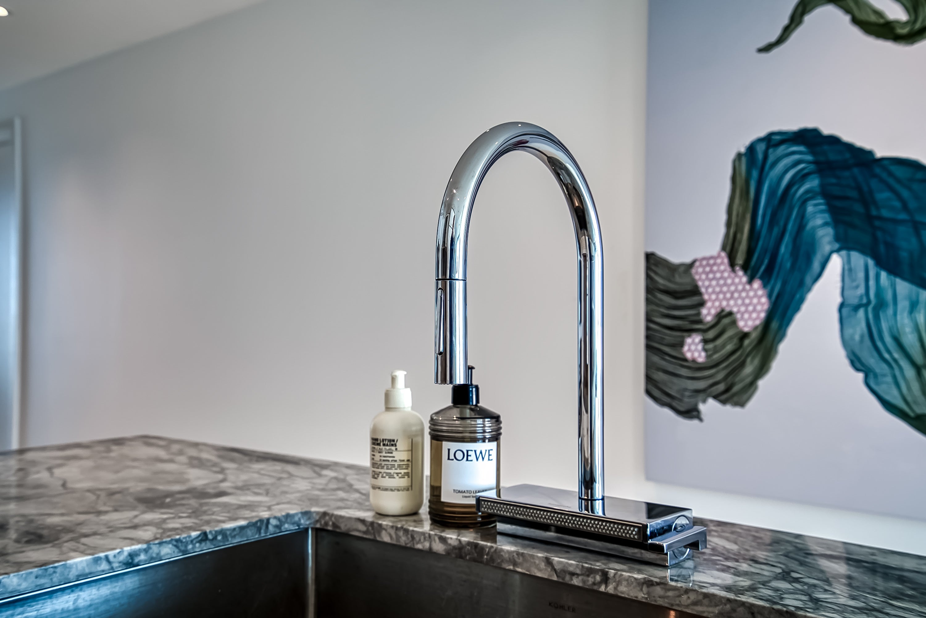 Poggenpohl White Modern Kitchen with Waterfall Island, Marble Countertops and Miele Appliances