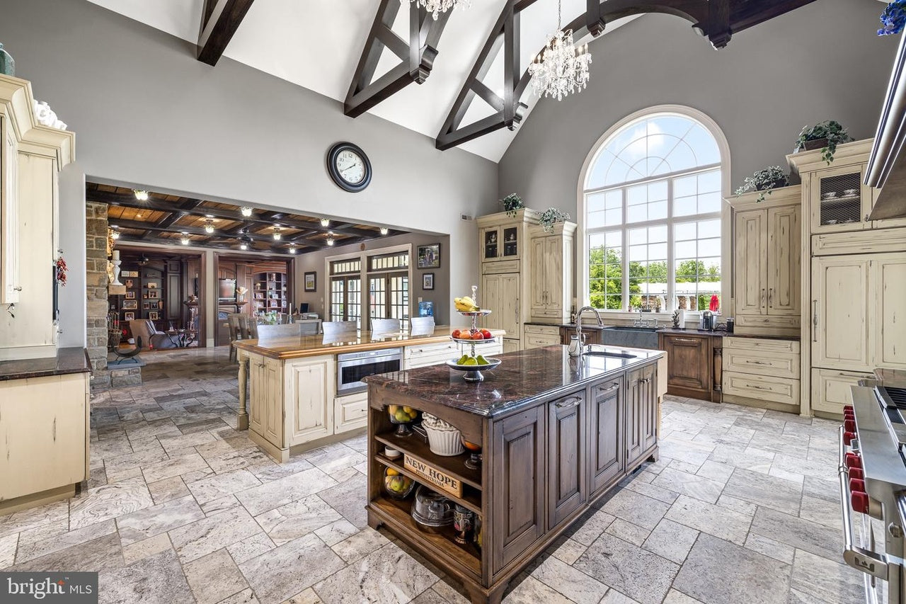 Custom Traditional Distressed Two-Tone Kitchen with Double Island, Stone Countertops and Sub-Zero & Wolf Appliances