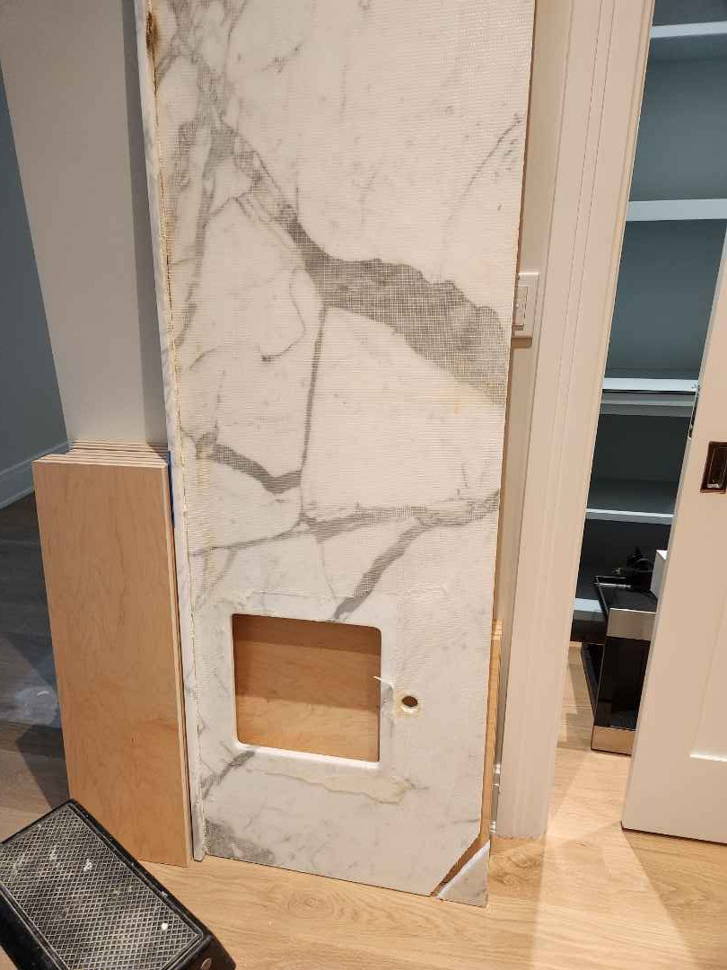 Custom Transitional Natural Wood Toned Butler's Pantry with Marble Countertops