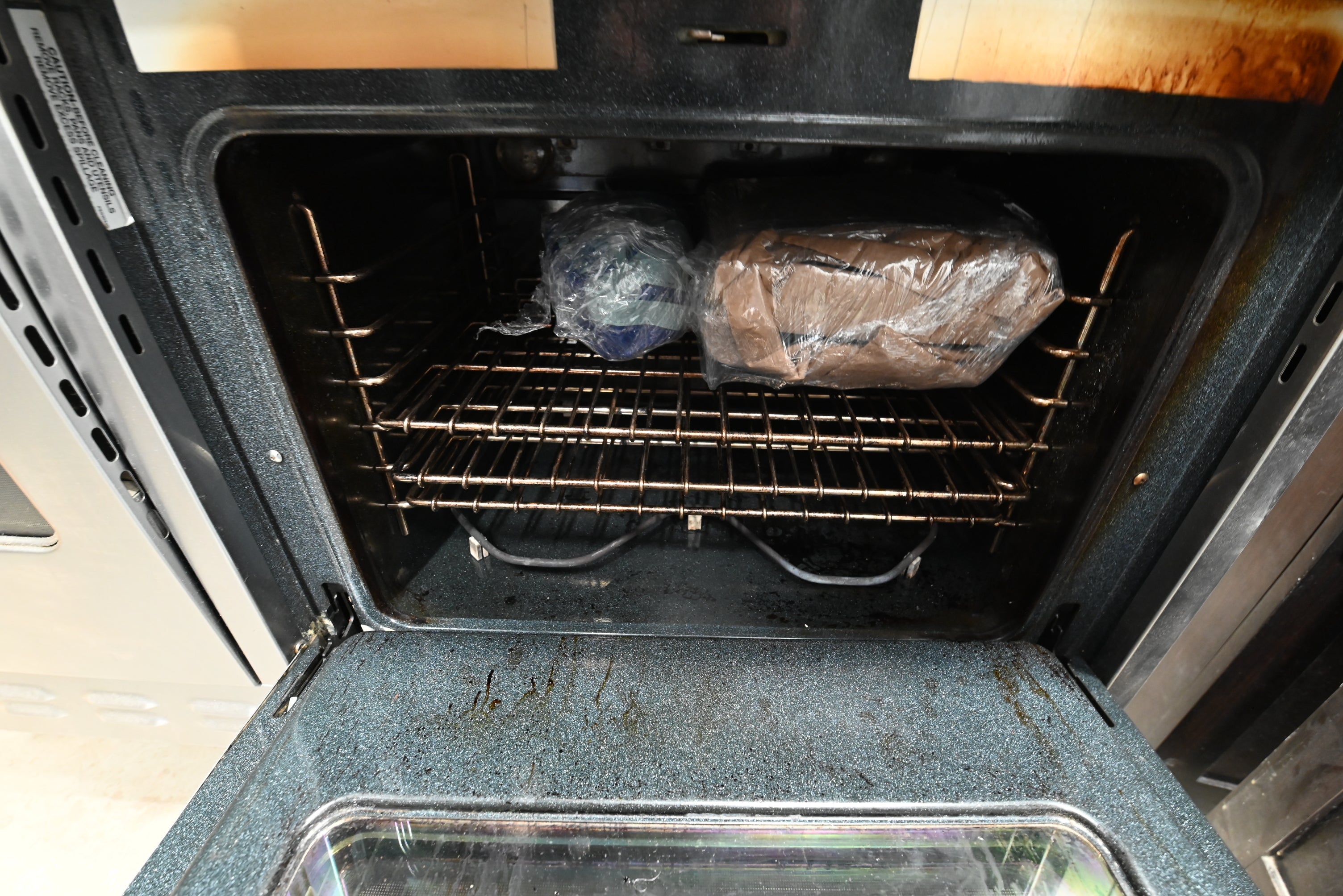 Transitional Dark Wooden Brown Kitchen with Island, Marble Countertops & Luxury Appliances