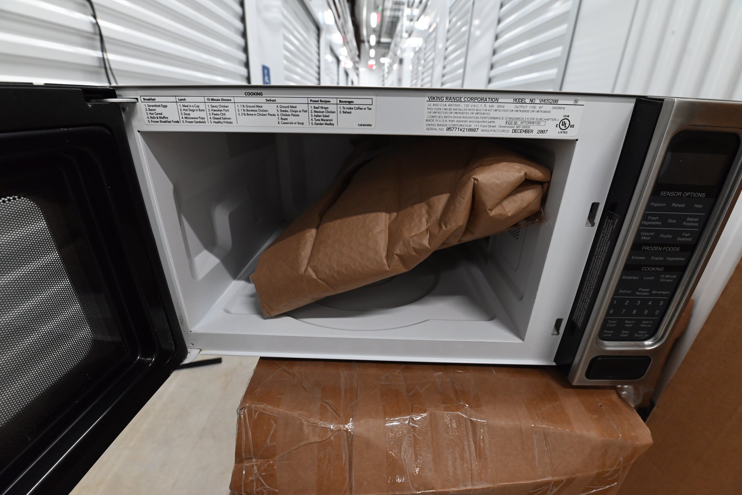 Traditional Dark Wooden Brown Kitchen with Island, Marble Countertops & Luxury Appliances