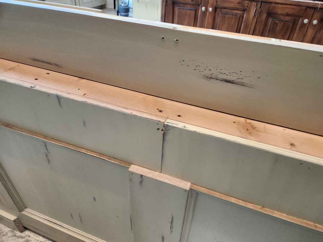 Custom Traditional Distressed Two-Tone Kitchen with Double Island, Stone Countertops and Sub-Zero & Wolf Appliances