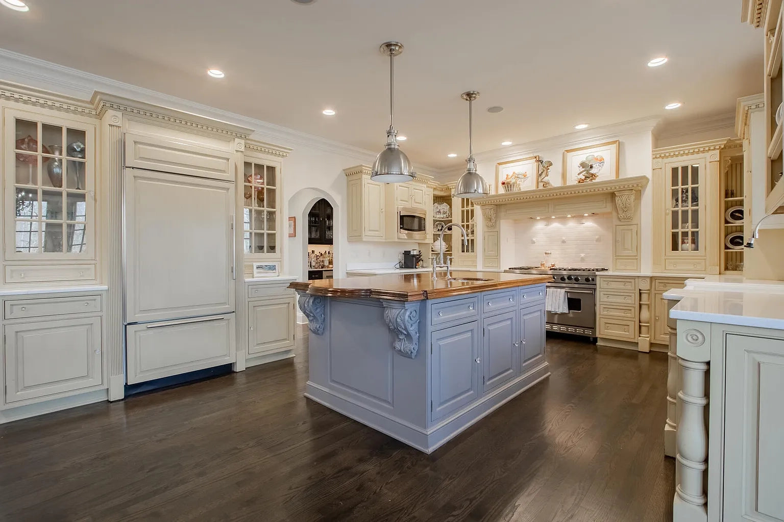 Custom Traditional "Clive-esque" Kitchen with Marble Countertops, Wood Top Island and Appliances