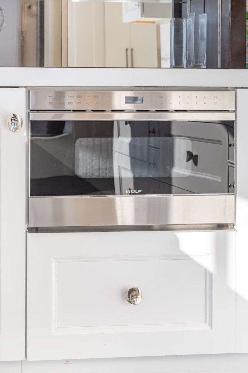 Rutt Regency Transitional White Kitchen with Wolf Appliances