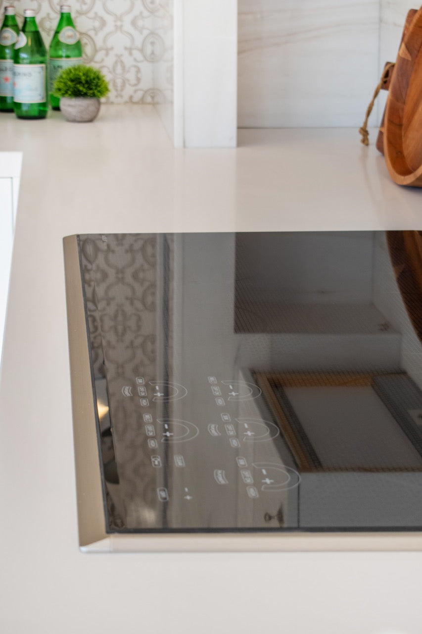 Rutt Regency Transitional White Kitchen with Wolf Appliances