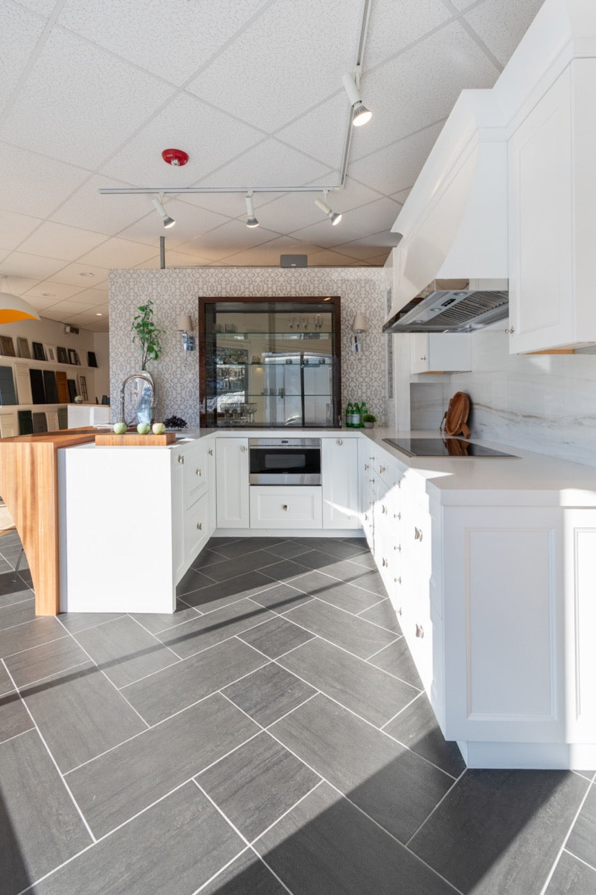 Rutt Regency Transitional White Kitchen with Wolf Appliances