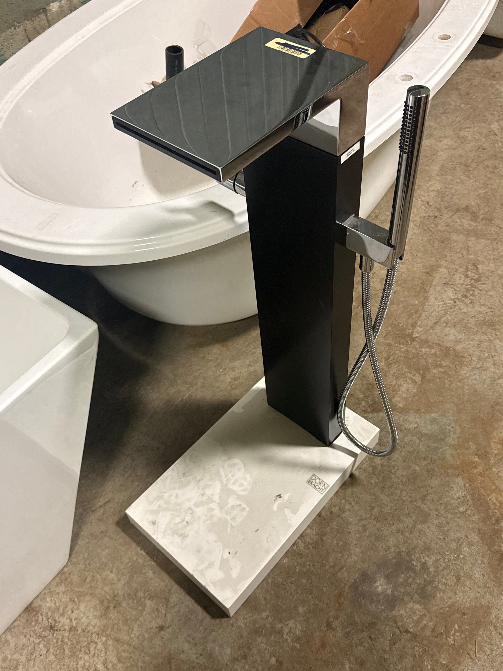 Dornbracht modern polished chrome freestanding tub filler with hand shower attachment