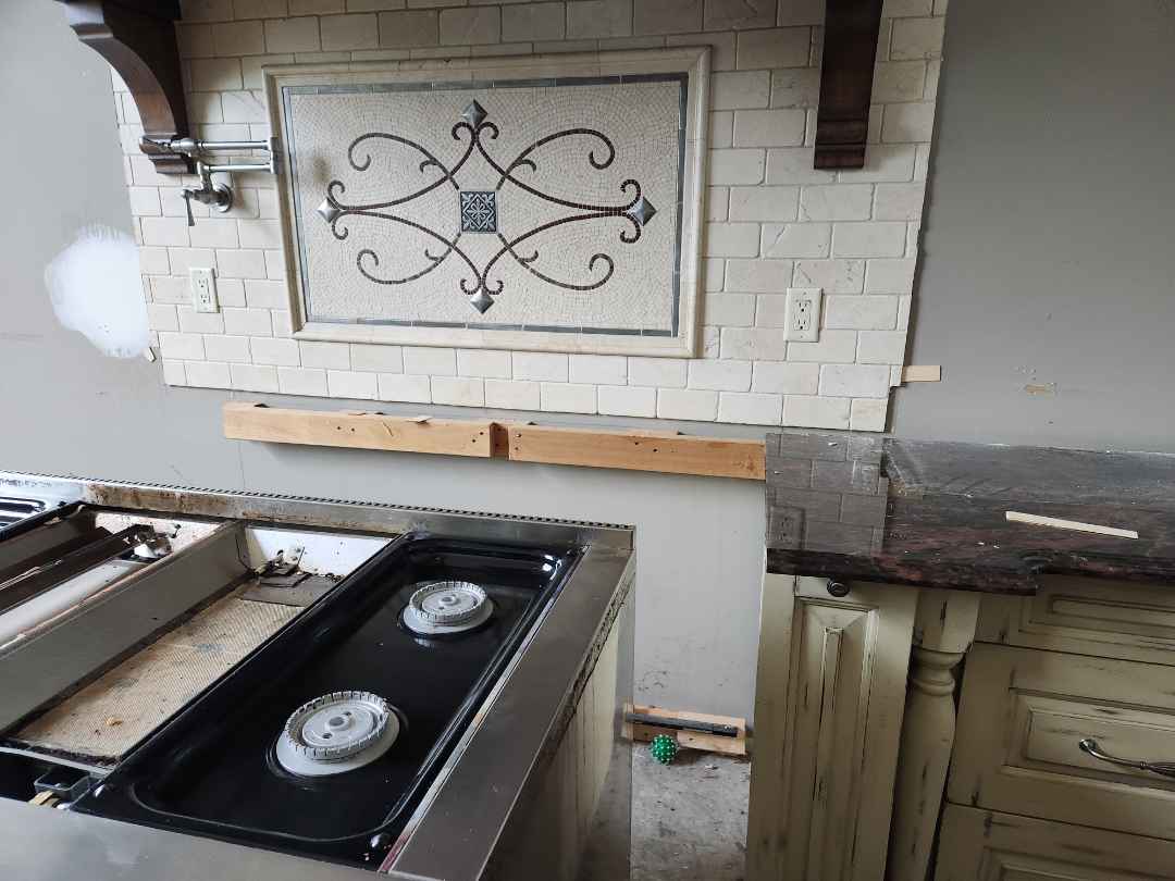 Custom Traditional Distressed Two-Tone Kitchen with Double Island, Stone Countertops and Sub-Zero & Wolf Appliances