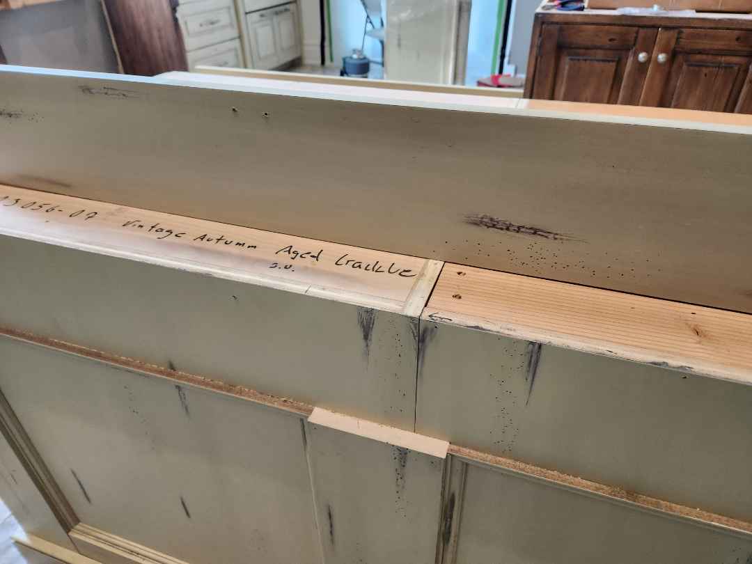 Custom Traditional Distressed Two-Tone Kitchen with Double Island, Stone Countertops and Sub-Zero & Wolf Appliances