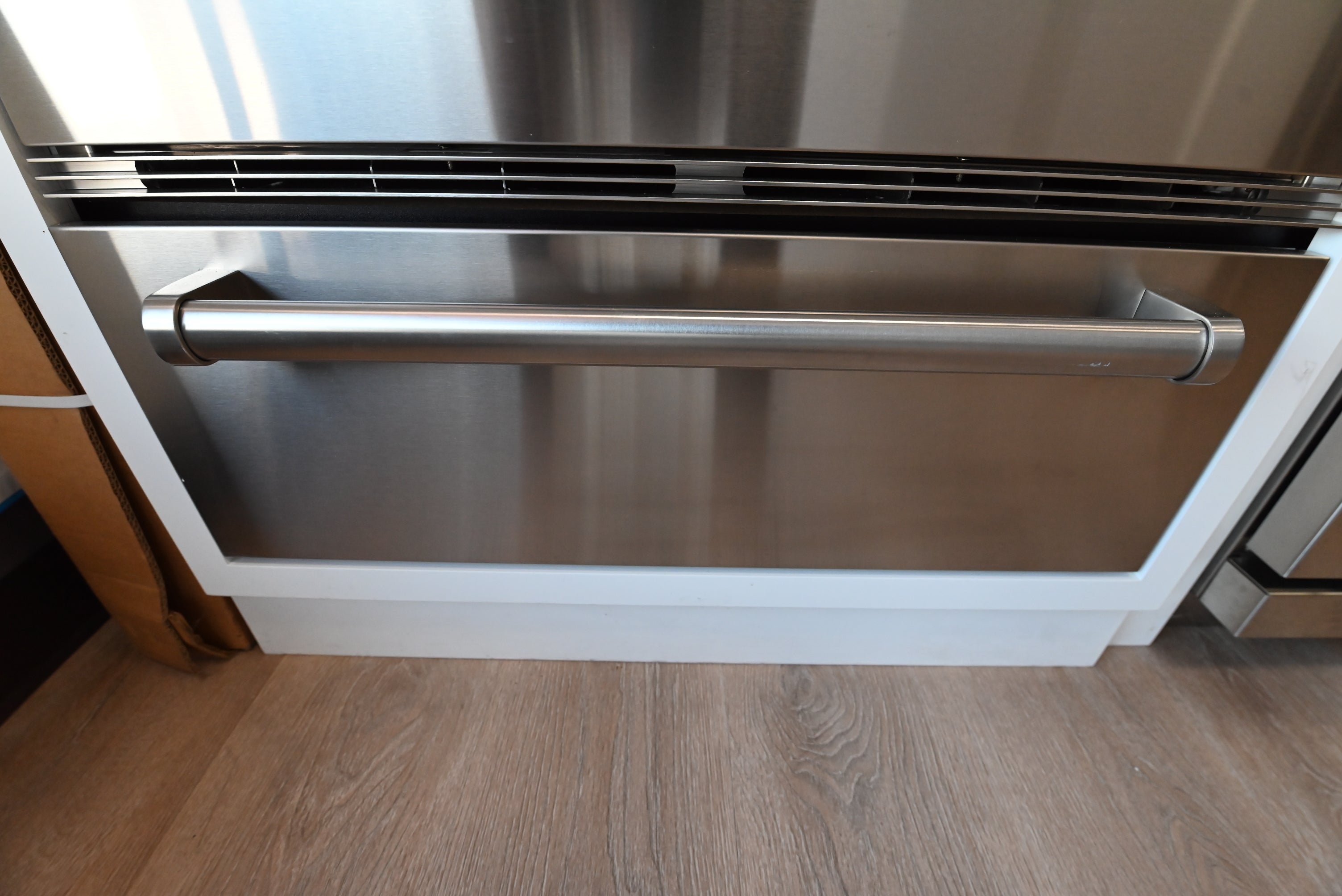 Wolf WWD30 30 inch integrated warming drawer front view with attached stainless steel panel