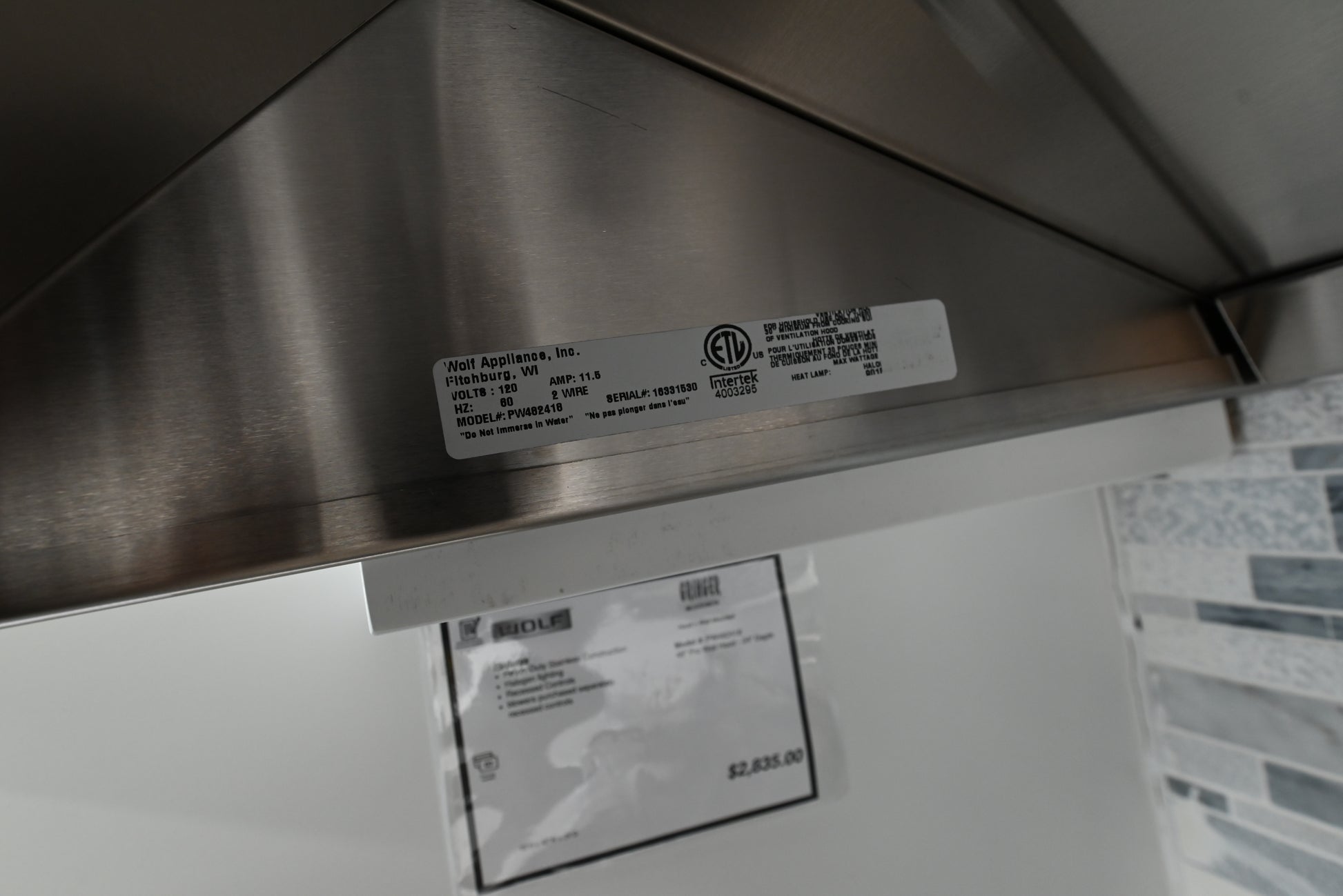 Luxury professional 24 inch deep stainless steel wall range hood by Wolf