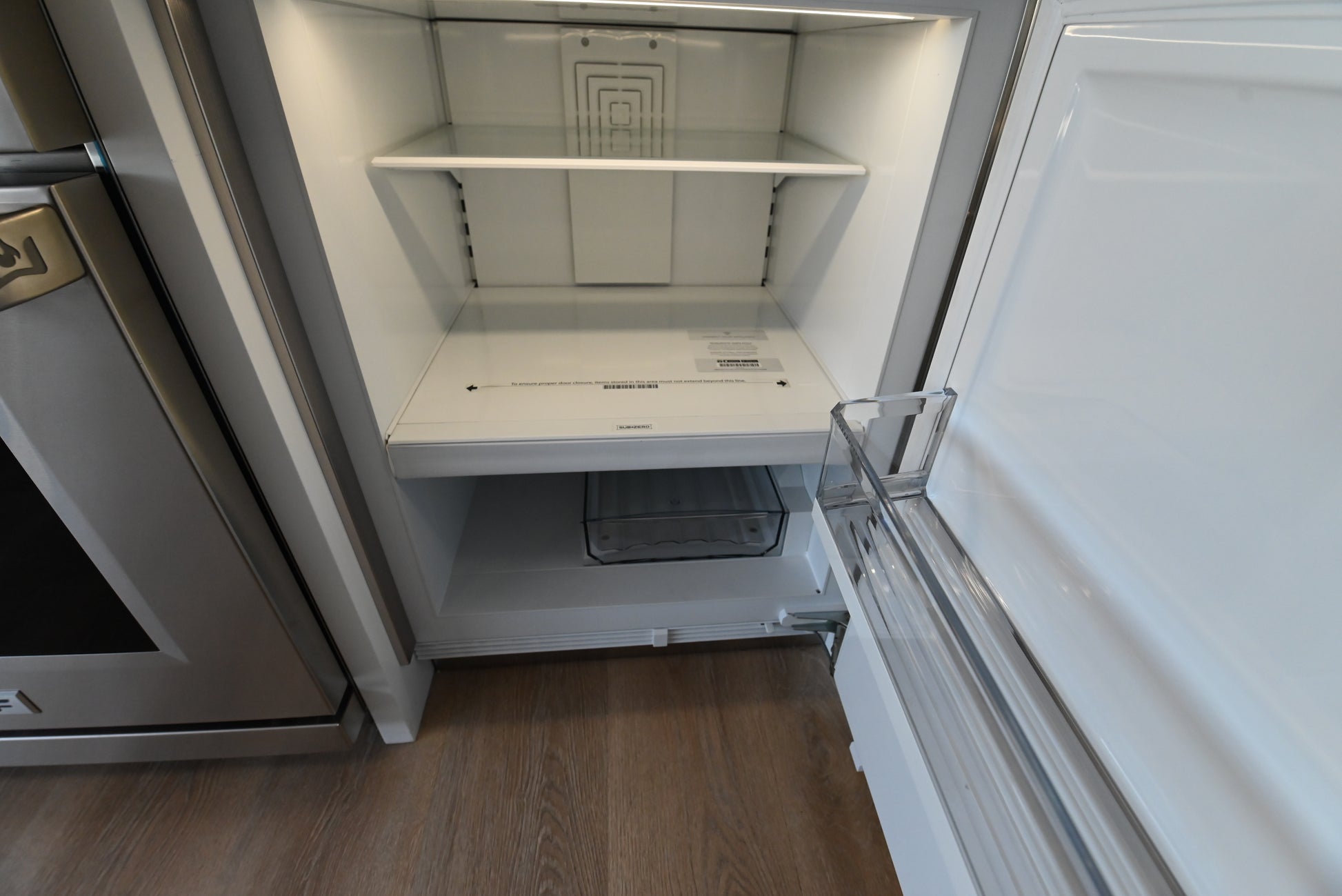 Luxury 24 inch integrated undercounter fridge freezer combo with automatic ice maker by Sub Zero