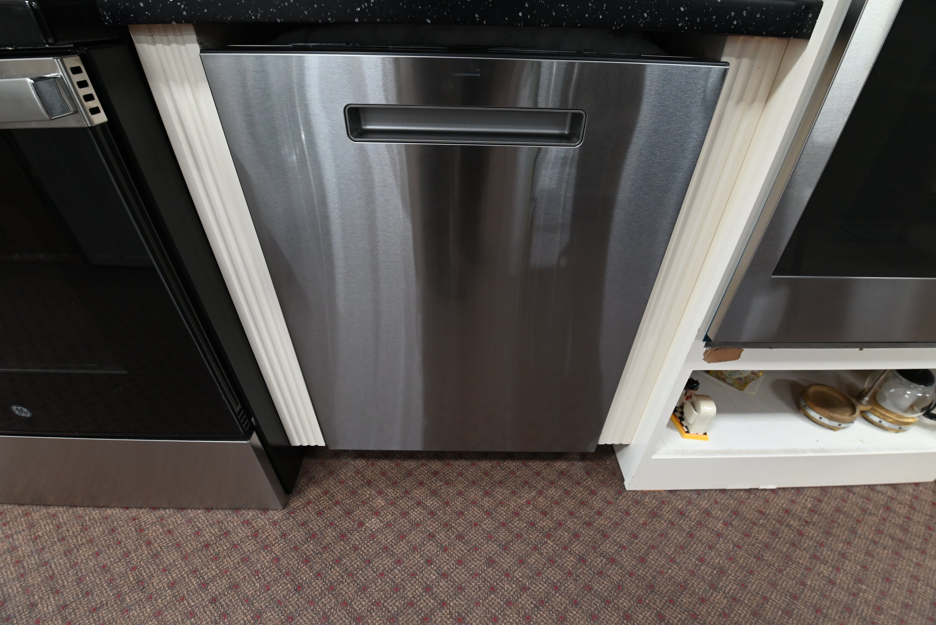 GE Profile PDP715SYVFS 24 inch built in smart dishwasher in fingerprint resistant stainless steel with top controls and a modern pocket handle