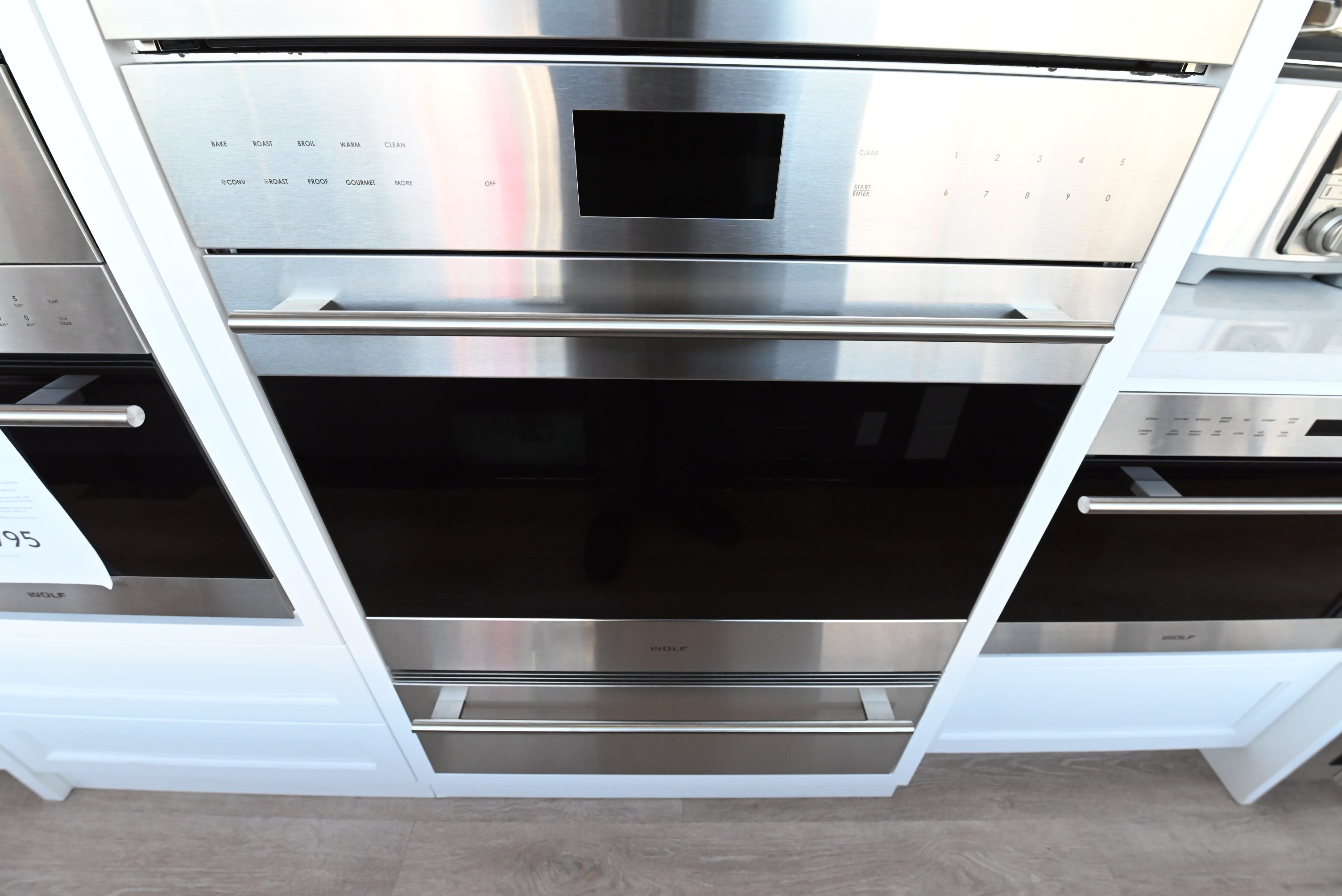 Wolf SO3050TE S TH 30 inch transitional single built in M series wall oven front view with tubular handle